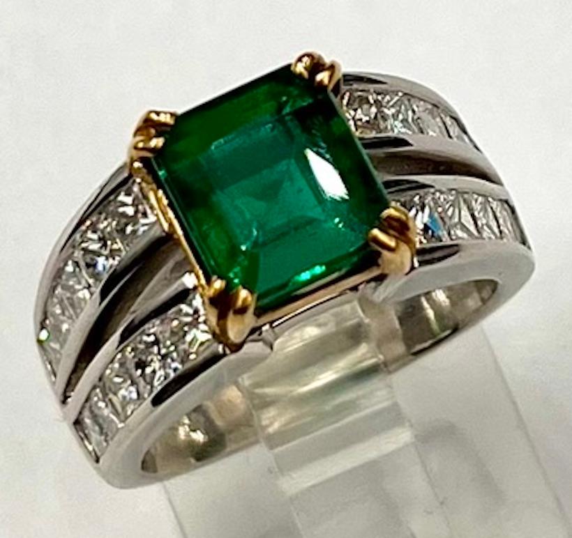 This is an elegant and classic ring featuring a very high quality 2.85Ct Emerald Cut Emerald whose origin is Brazil. The shade of green resembles that of a deep forest and the Emerald is very clear and translucent. The cutting of this gemstone is