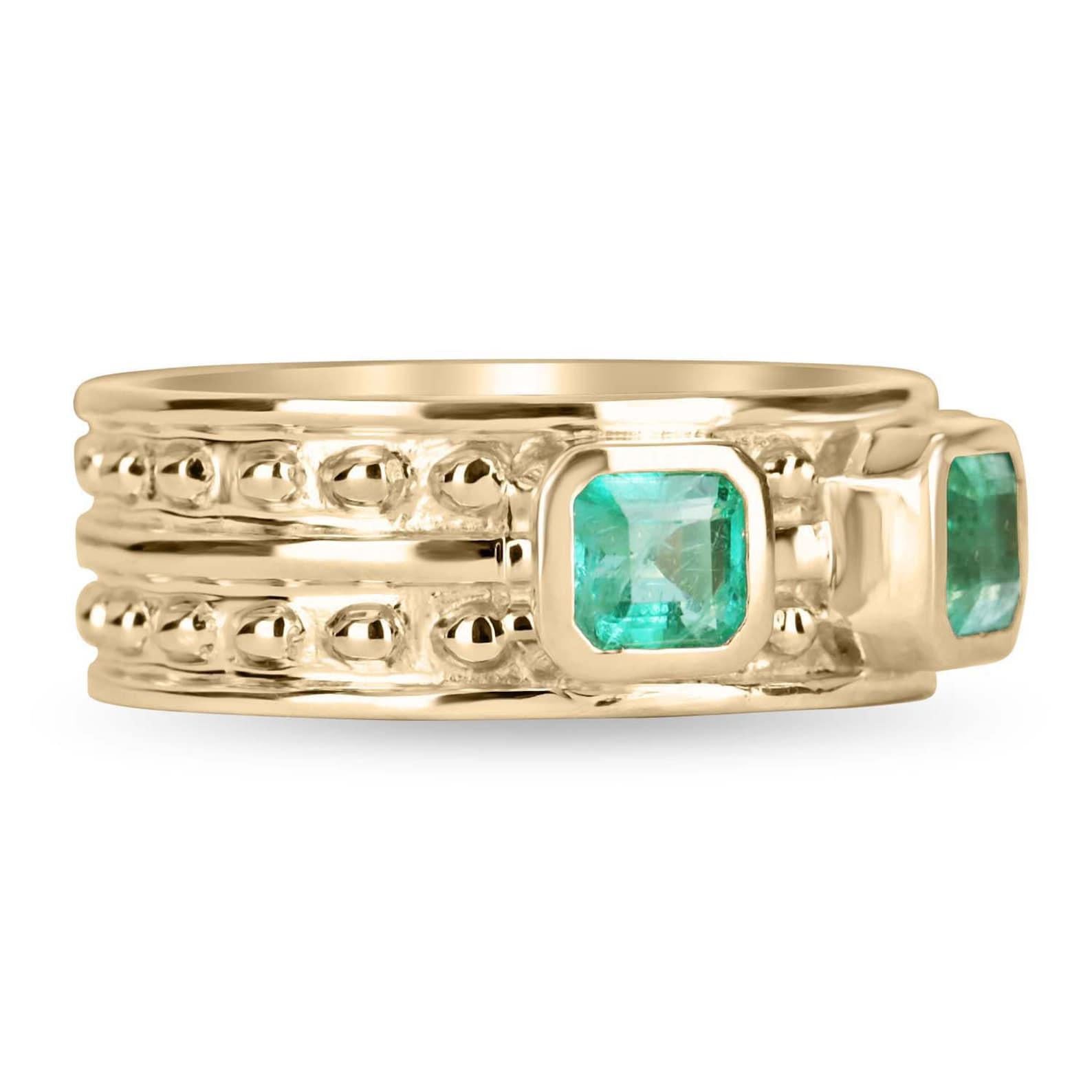 Exceptional and unique, this is a men's 14K solid gold genuine emerald band. The men's emerald band features an excellent, bold, and masculine design. Securely bezel-set, large, the emeralds sit within a secure golden frame and show very good