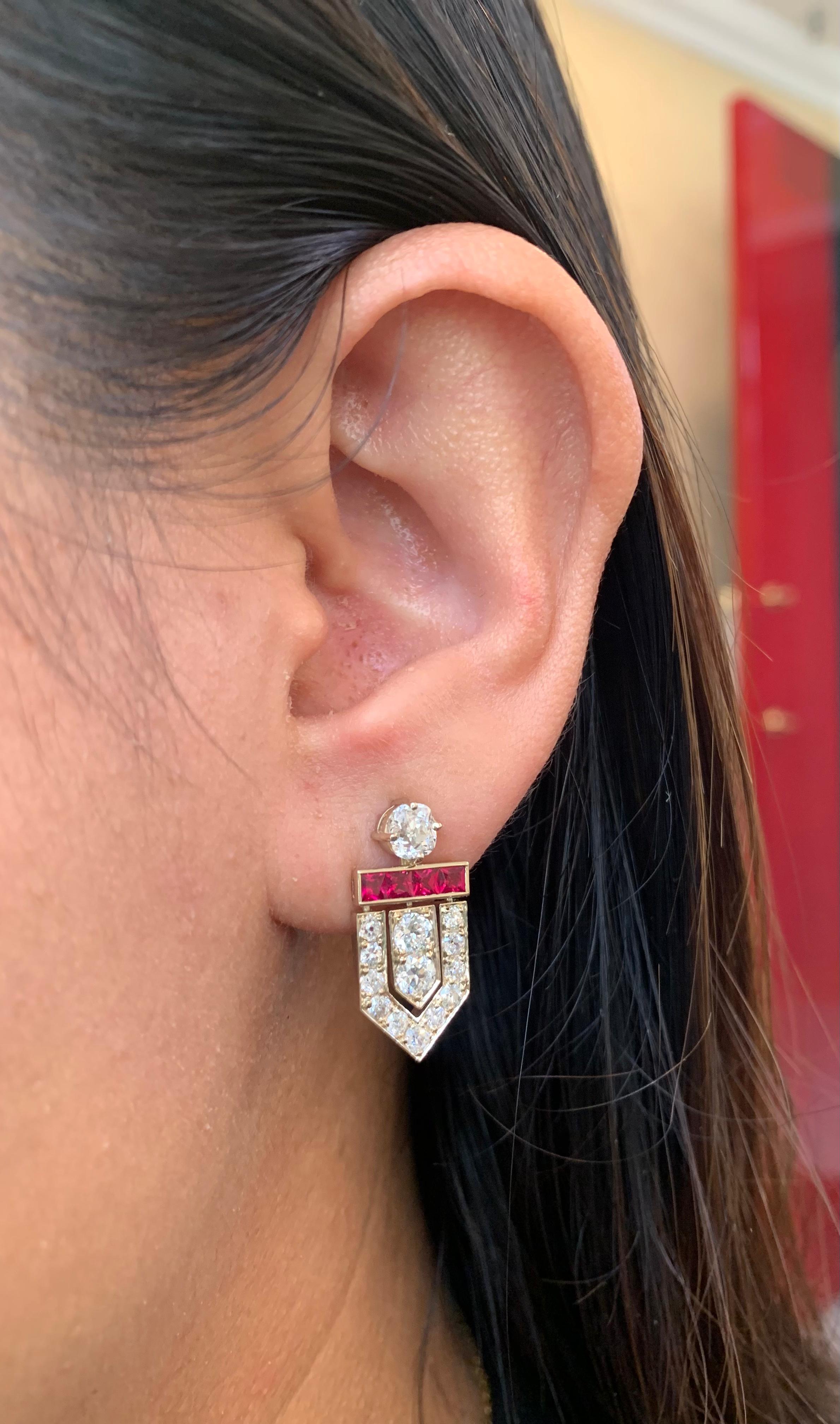This exquisite diamond and ruby earrings are made by Rewa jewels in 18 karat white gold.

There are 2 pieces of diamonds at the top weighing approximately 1.12 carat. Along with 4 pieces of diamonds in the centre weighing approximately 0.79 carat