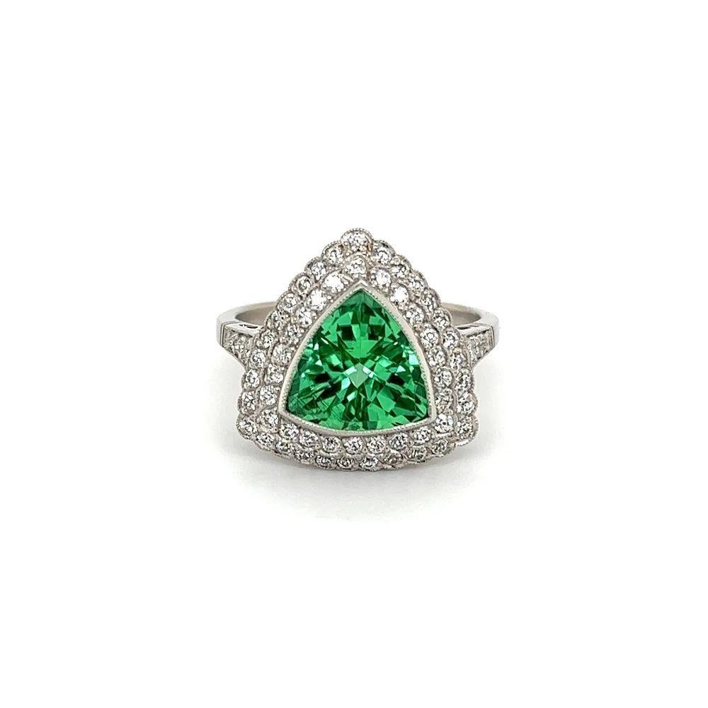 Simply Beautiful! Green Trillion Paraiba Tourmaline IGI and Diamond Platinum Cocktail Ring. Centering a securely nestled Hand set Green Trillion Paraiba Tourmaline, weighing 2.86 Carat. IGI certificate #GT10962908. Surrounded by Diamonds. Approx.