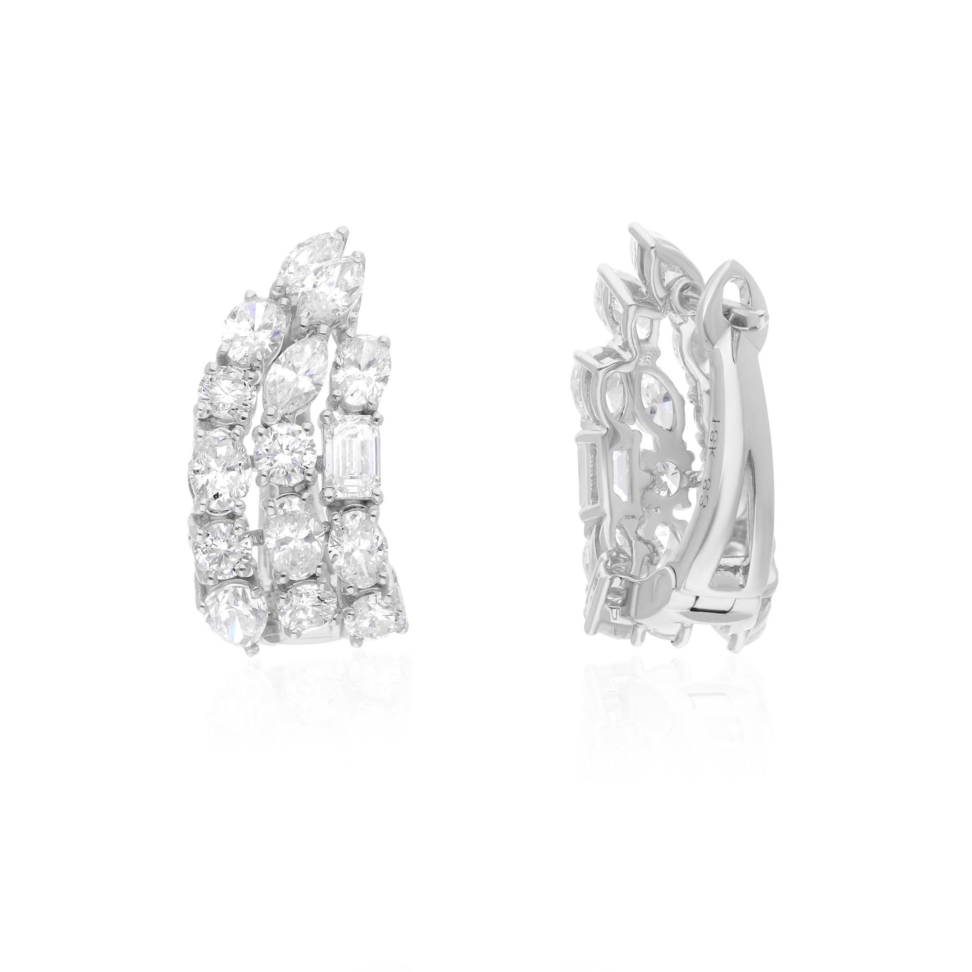 Immerse yourself in luxury with these breathtaking 2.86 Carat Multi Shape Diamond Earrings, an exquisite showcase of artistry and elegance. Crafted in 14 Karat White Gold, these earrings feature a dazzling array of diamonds in various shapes,
