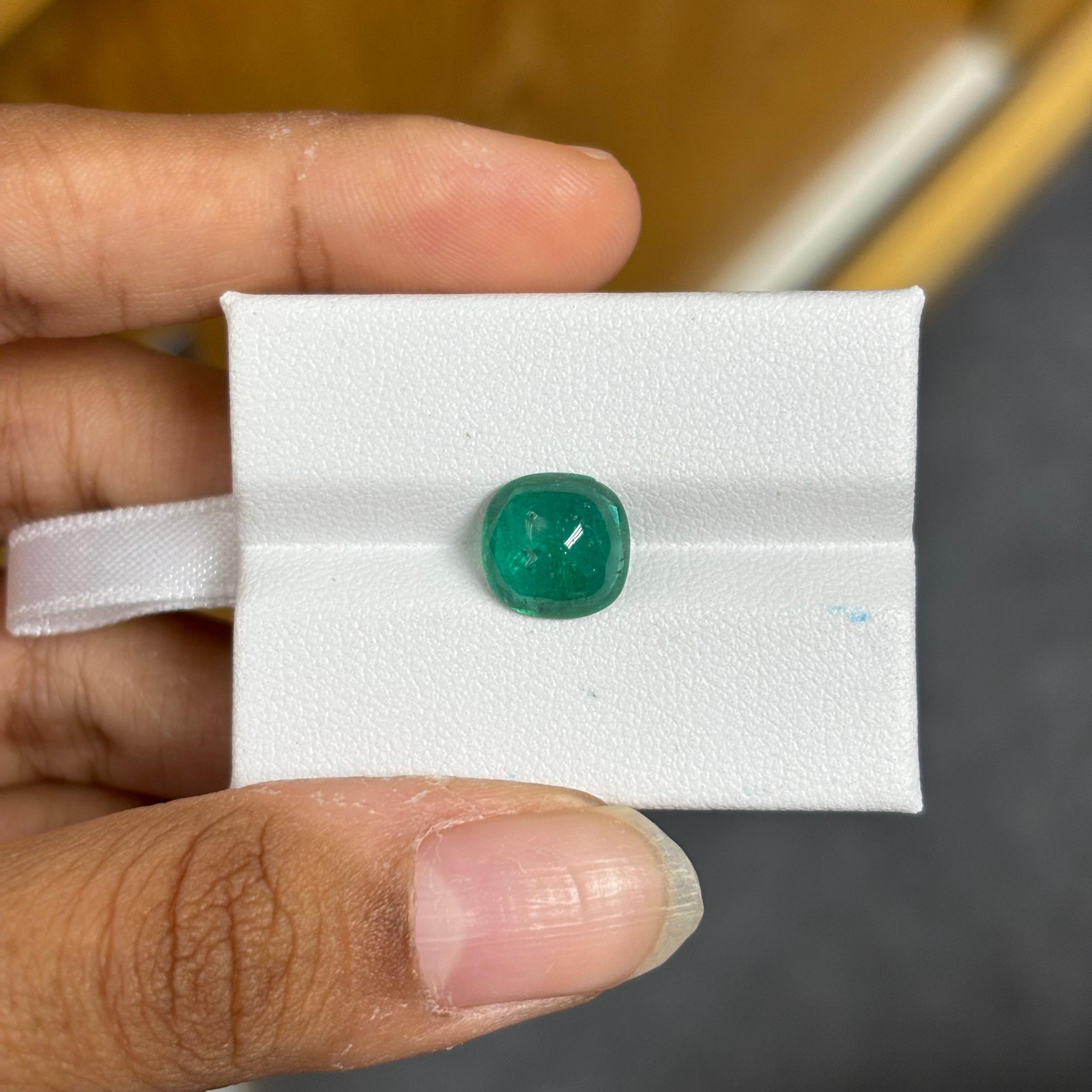 A stunning 2.86 Carat Emerald stone that is a gorgeous shade of vivid green and originates from Zambia. It is completely natural and of good quality. The emerald piece is cut into perfection in a sugarloaf-cut shape.

The green emerald has only