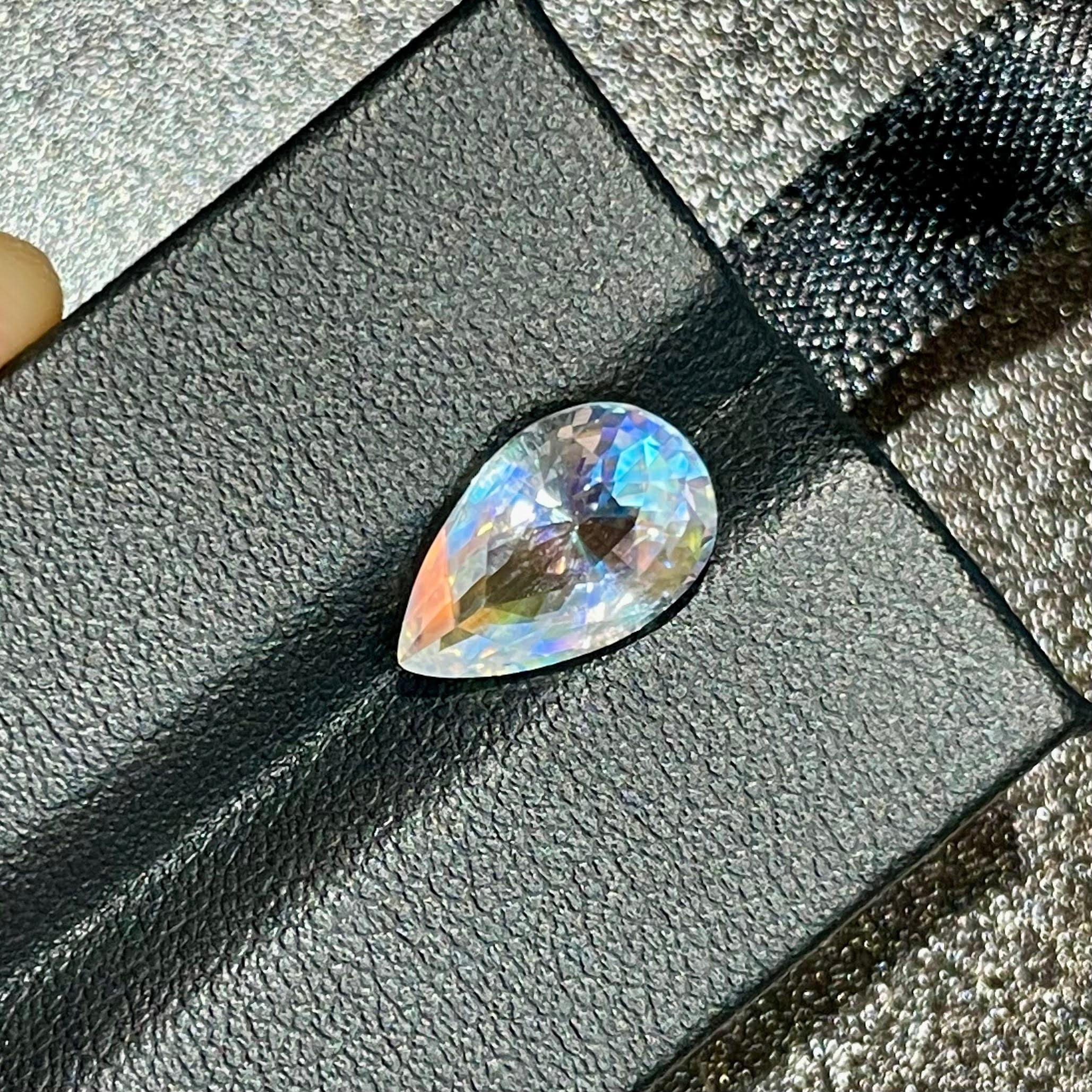 Weight 2.86 carats 
Dimensions 12.3x7.7x5.9 mm
Treatment none 
Origin India 
Clarity VVS 
Shape Pear 
Cut Faceted 



This stunning 2.86 carat rainbow moonstone is a natural gem sourced from India, celebrated for its mystical beauty and exceptional