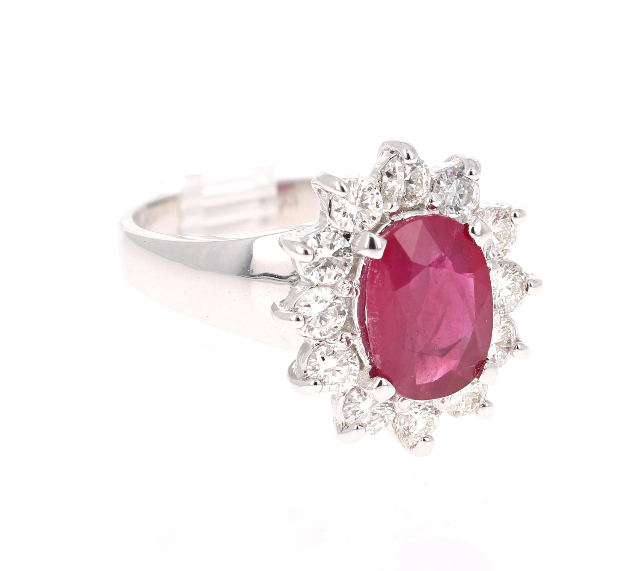Simply beautiful Ballerina Ruby Diamond Ring with a Oval Cut 2.04 Carat Ruby which is surrounded by 12 Round Cut Diamonds that weigh 0.82 carats. The total carat weight of the ring is 2.86 carats. The clarity and color of the diamonds are VS-F. The