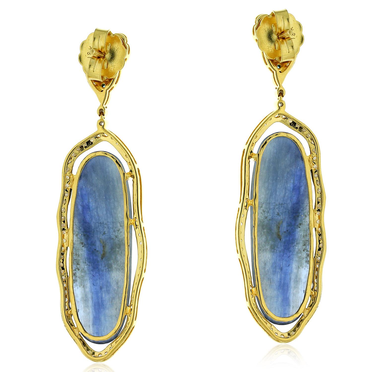 These beautiful drop earring are handcrafted in 18-karat gold. It is set in 28.65 carats Kyanite and 1.72 carats of glimmering diamonds.

FOLLOW  MEGHNA JEWELS storefront to view the latest collection & exclusive pieces.  Meghna Jewels is proudly
