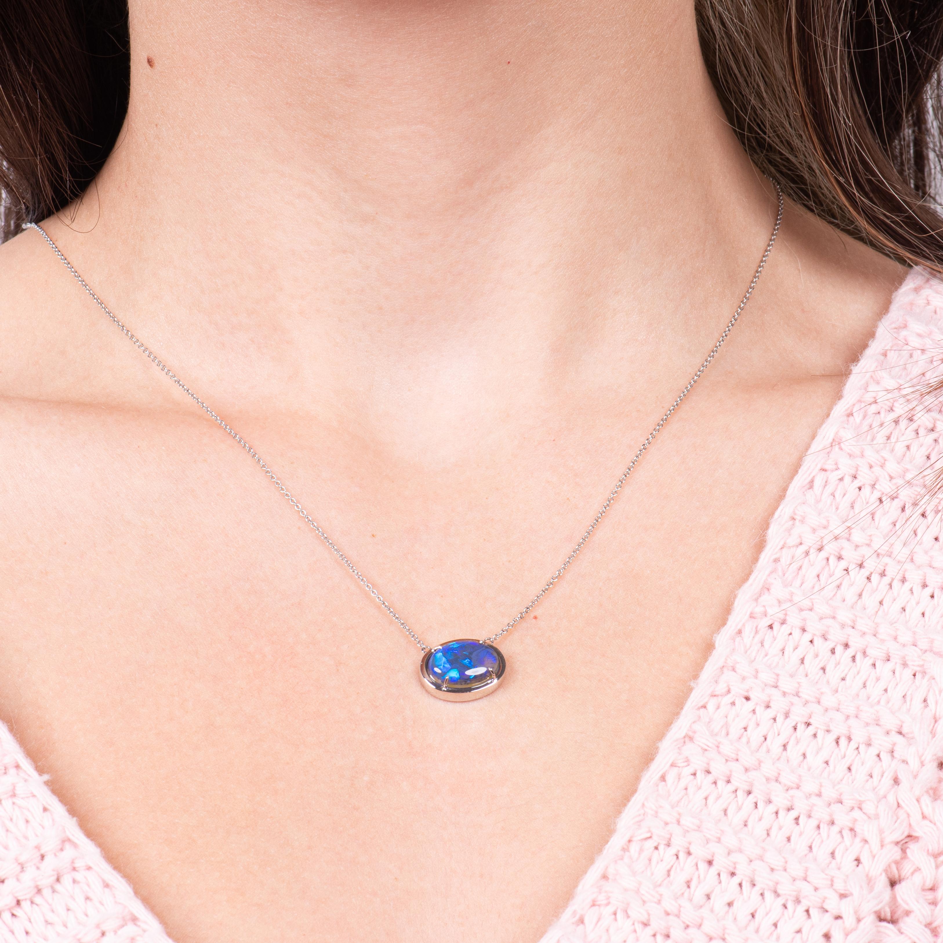 This pendant is a 2.86ct Lightning Ridge Australian blue opal set in an 18kt white gold pendant.