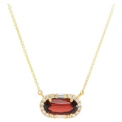 2.86ct Garnet 
0.50ctw Baguette, Round Diamond Frame Pendant Necklace in 14kt