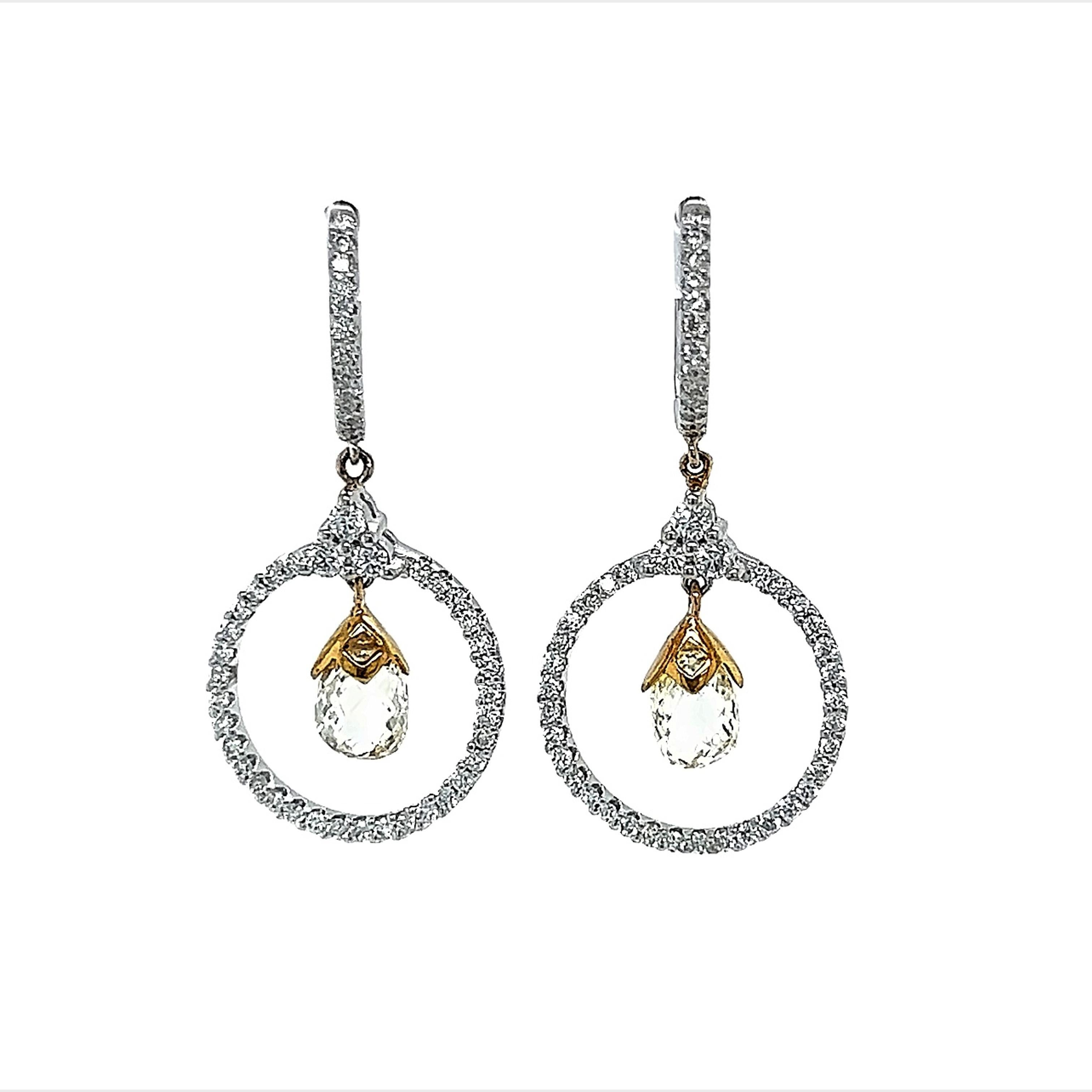 Unique briolette diamond with loop drop earrings.
2.86 carats total diamond weight.
2 briolette cut diamonds, 2.12 carats. Approximately Fancy Light Yellow color and VS1 clarity. 0.74 carats of round diamonds. Approximately F/G color and VS2