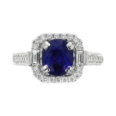 Bague de fiançailles en platine avec saphir bleu ovale de 2,87 carats et halo de diamants