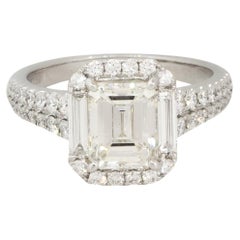 2.87 Carat Emerald Cut Diamond Halo Engagement Ring 18 Karat in Stock