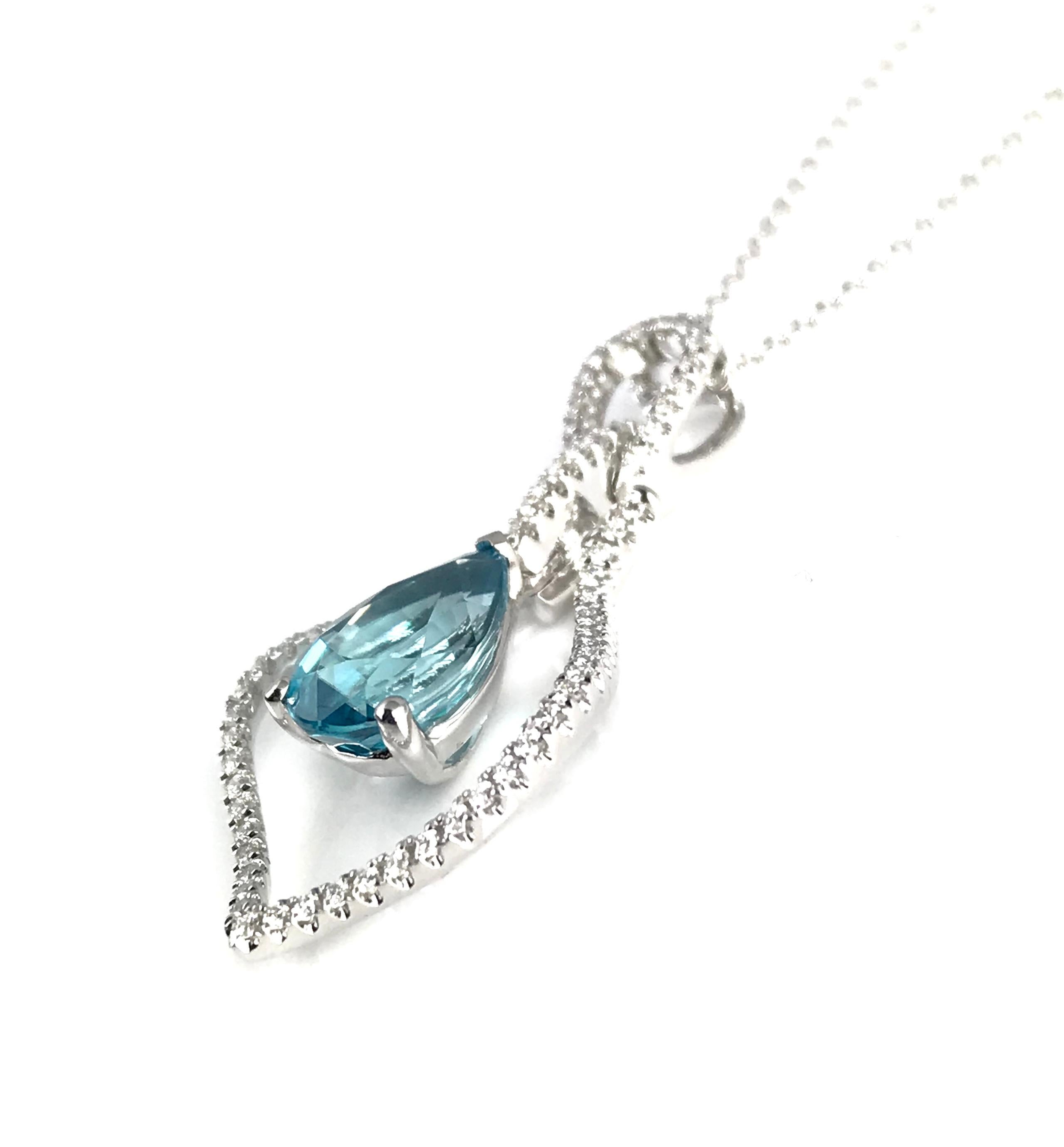 Embrace the allure of our exquisite Blue Zircon Teardrop Pendant, where a singular 2.87 carat pear-shaped blue zircon takes center stage, suspended with grace inside a modern teardrop-shaped diamond frame. The frame itself, adorned with brilliant