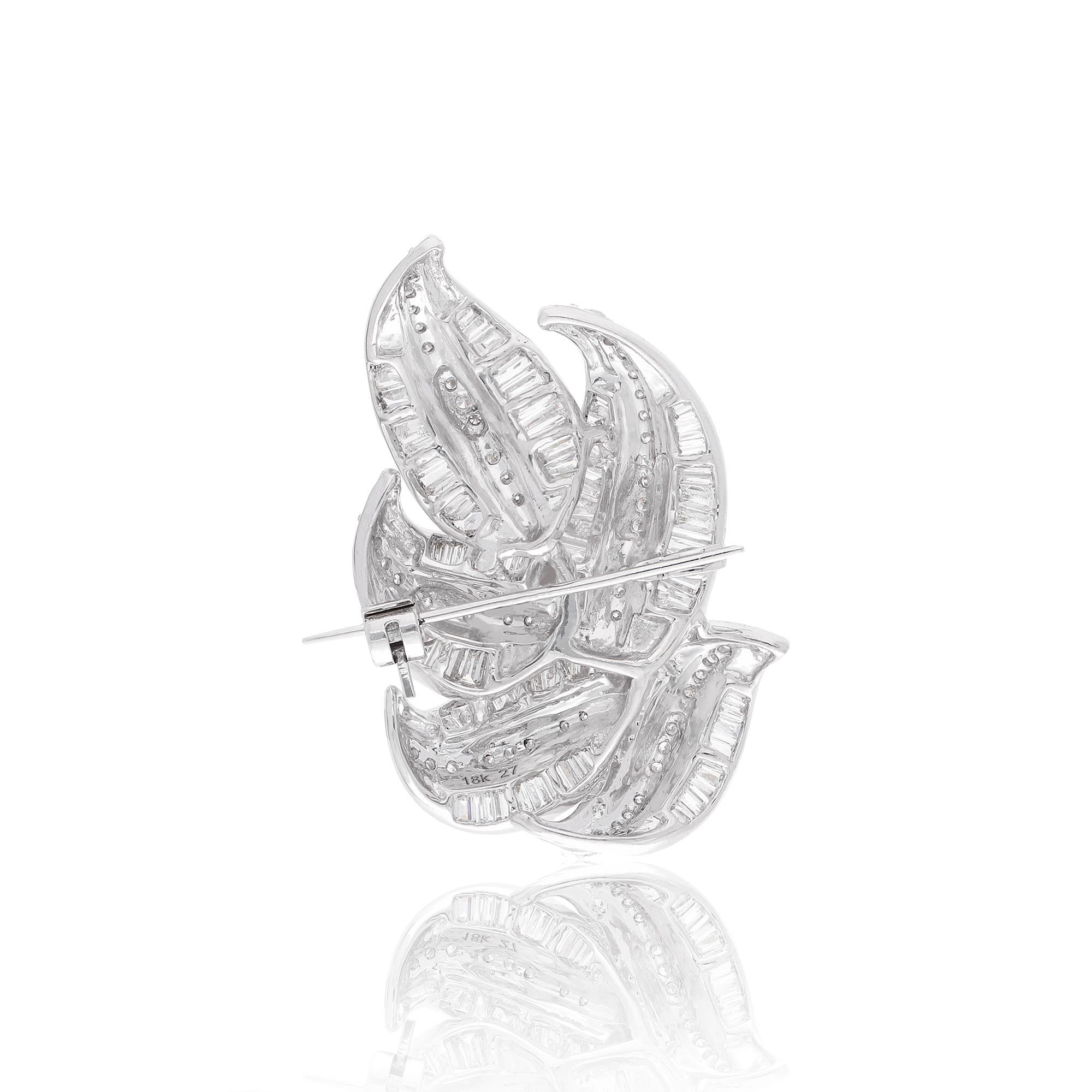Step into the enchanting world of fine jewelry with this mesmerizing 2.87 Carat Baguette Diamond Leaf Brooch crafted in opulent 18 Karat White Gold. Inspired by the delicate beauty of nature, this exquisite piece exudes elegance and sophistication,