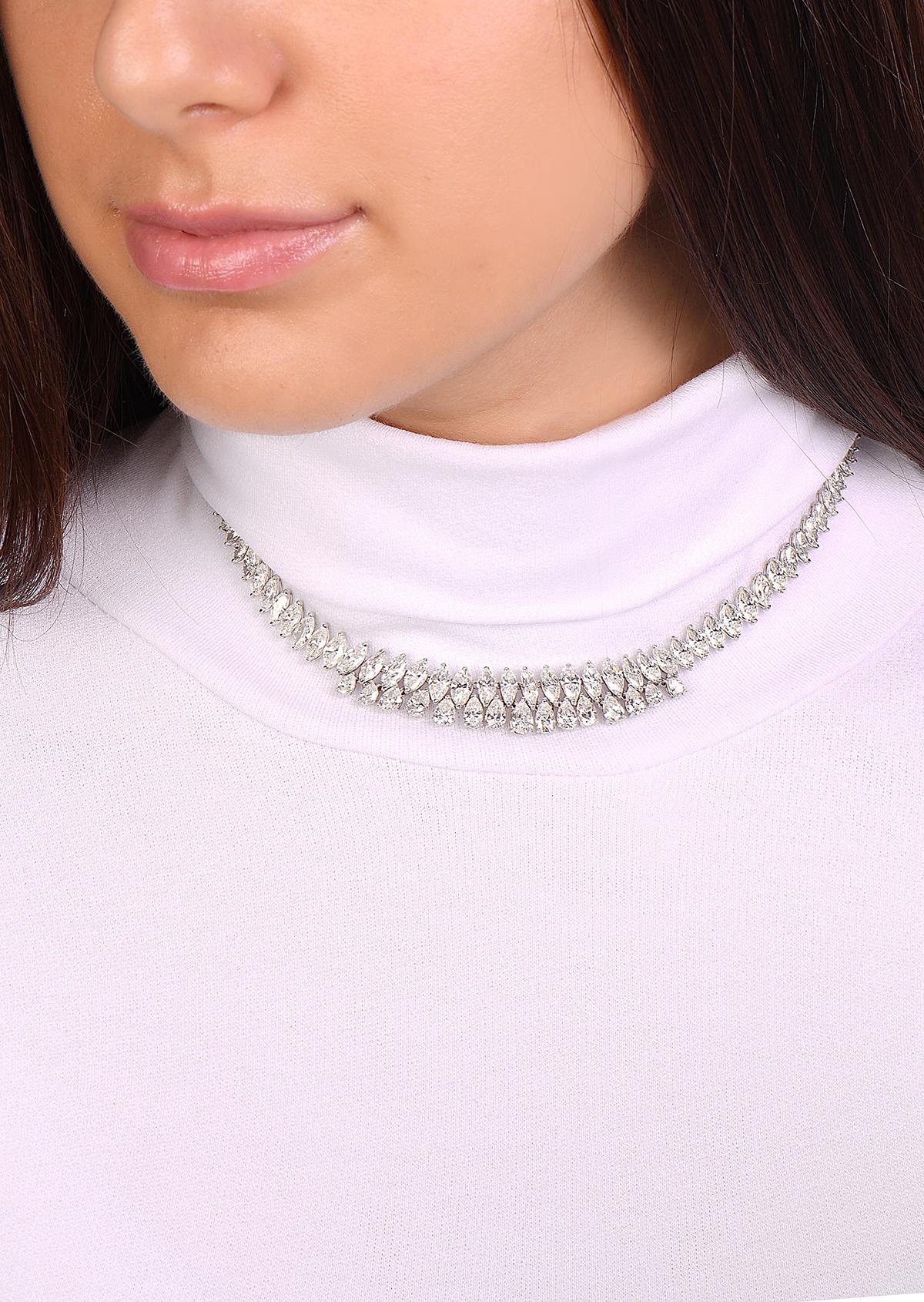 This necklace features 28.72 carats of G-H VS diamonds 15 pears and 20 marquise diamonds set in 18K white gold. This vintage necklace was made in Italy with the highest quality standards of craftsmanship. It has a comfort fit and molds to the curves