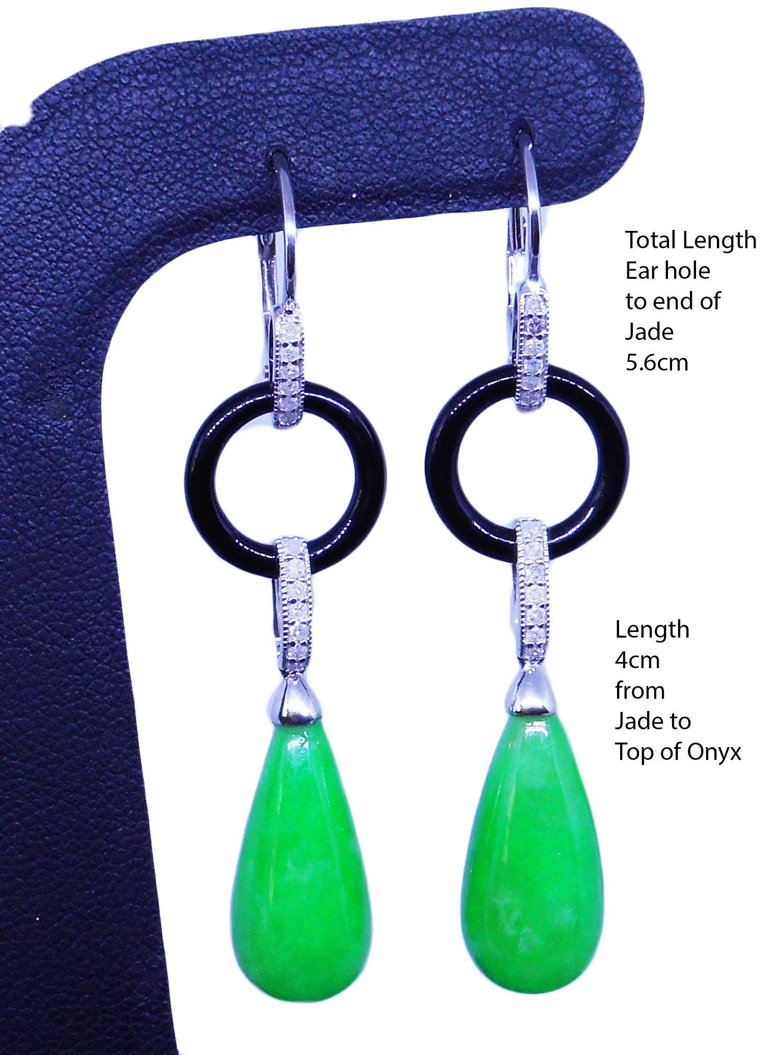 A PAIR OF  JADE AND DIAMOND DROP EARRINGS by Emily Sam Collection 

2 Jade 28.78 Carat
2 Onyx 3.10 Carat
28 Diamonds totalling 0.23 Carat
Free express delivery with postage from Sydney to New York approx. 3-4 days
Free Insurance
by Emily Sam