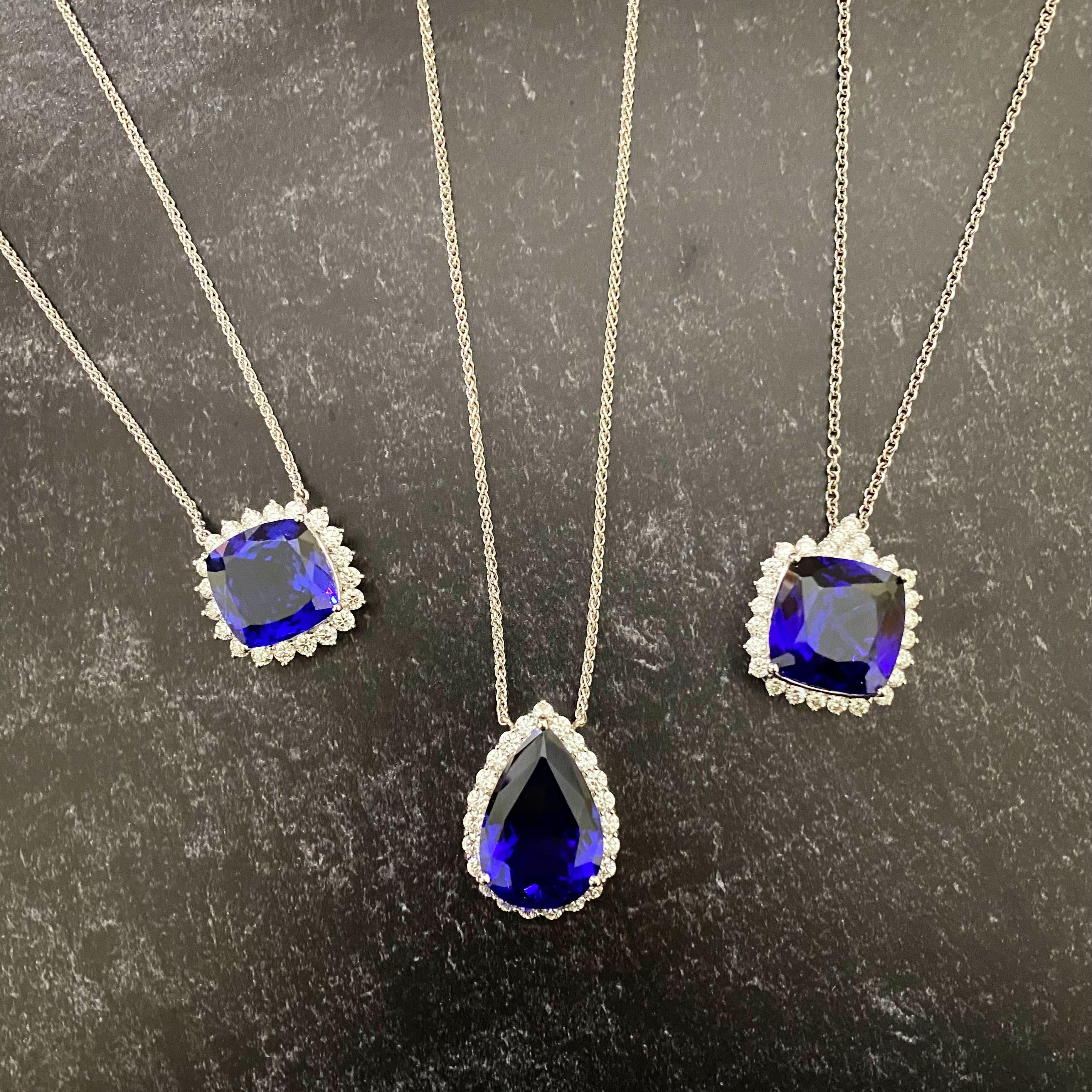 18k White Gold
Center Stone: 1 Pear Shaped Tanzanite at 28.78 Carats- Measuring 27 x 18 mm
Diamonds: 24 Brilliant White Round Diamonds at 2.70 carats - Color: HI - Clarity: SI

Fine one-of-a-kind craftsmanship meets incredible quality in this