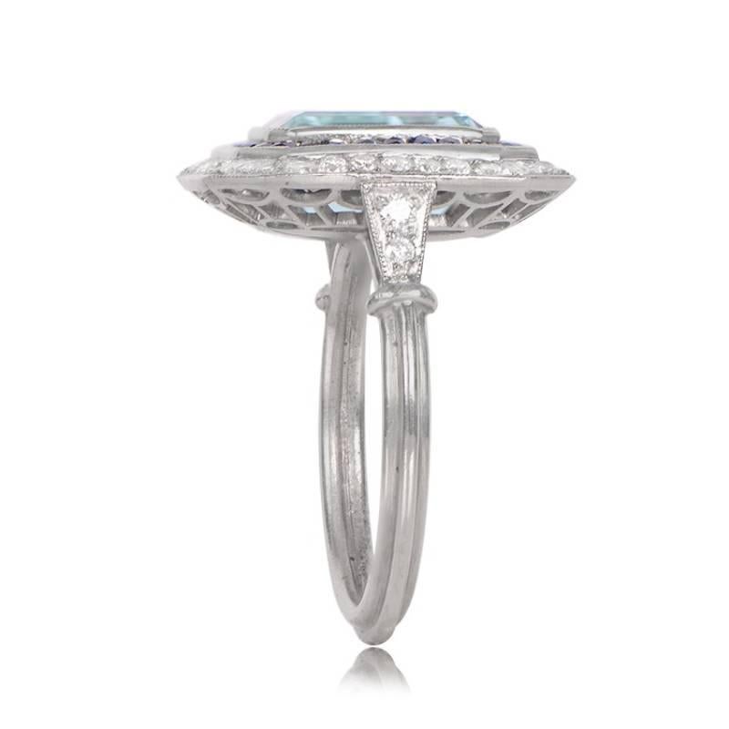 3.12ct Emerald Cut Aquamarine Cocktail Ring, Diamond & Sapphire Halo, Platinum In Excellent Condition For Sale In New York, NY