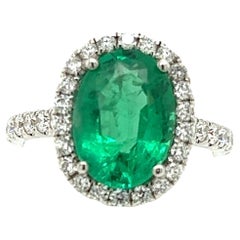 2.88 Carat Emerald & Diamond Halo Ring in 18 Karat White Gold