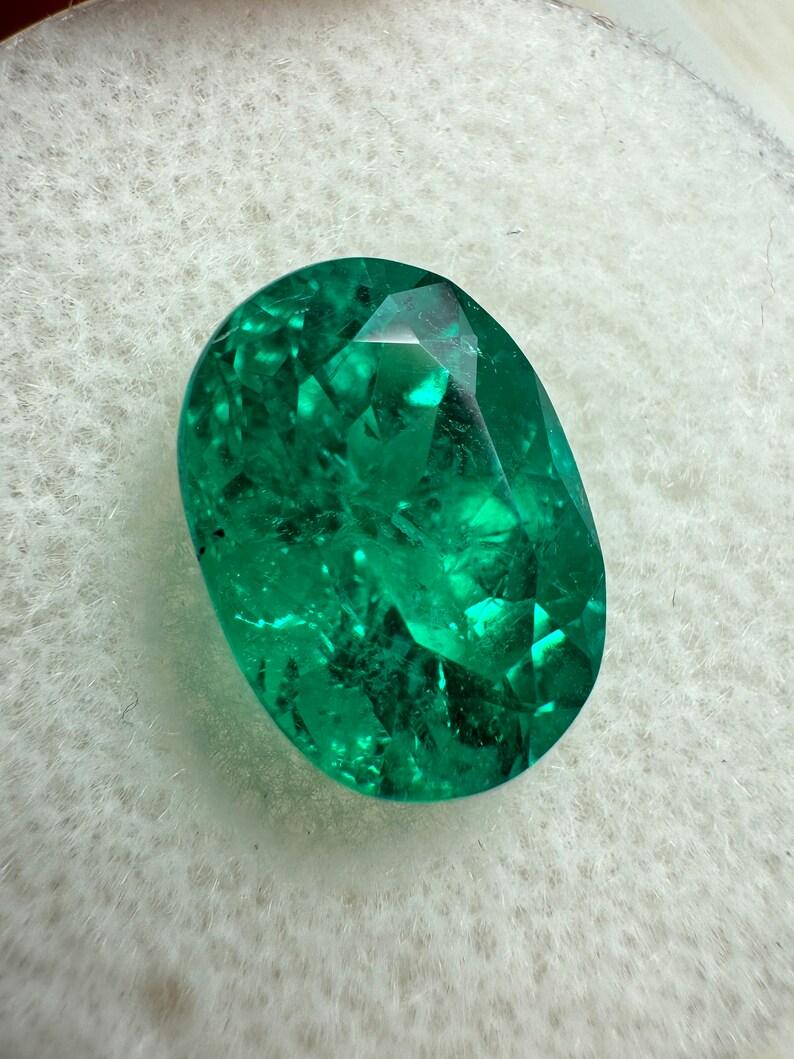 Modern 2.88 Carat GIA Certified 11x8 AAA+ MUZO Green Oval Colombian Emerald Gemstone For Sale