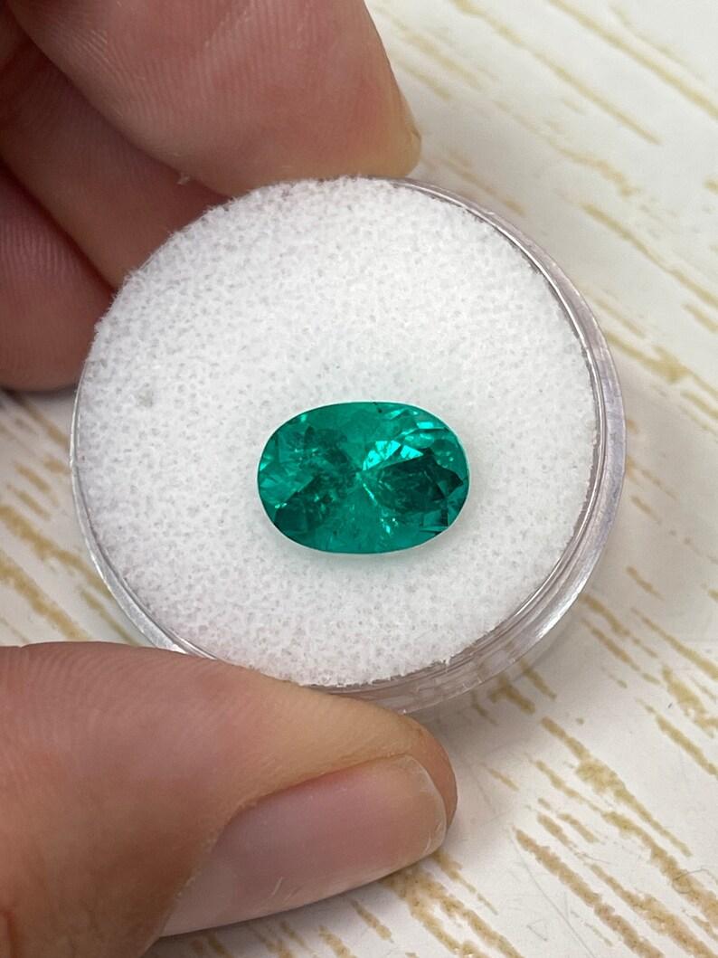 Oval Cut 2.88 Carat GIA Certified 11x8 AAA+ MUZO Green Oval Colombian Emerald Gemstone For Sale