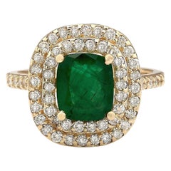 Anello con smeraldo naturale e diamante in oro giallo 14 carati