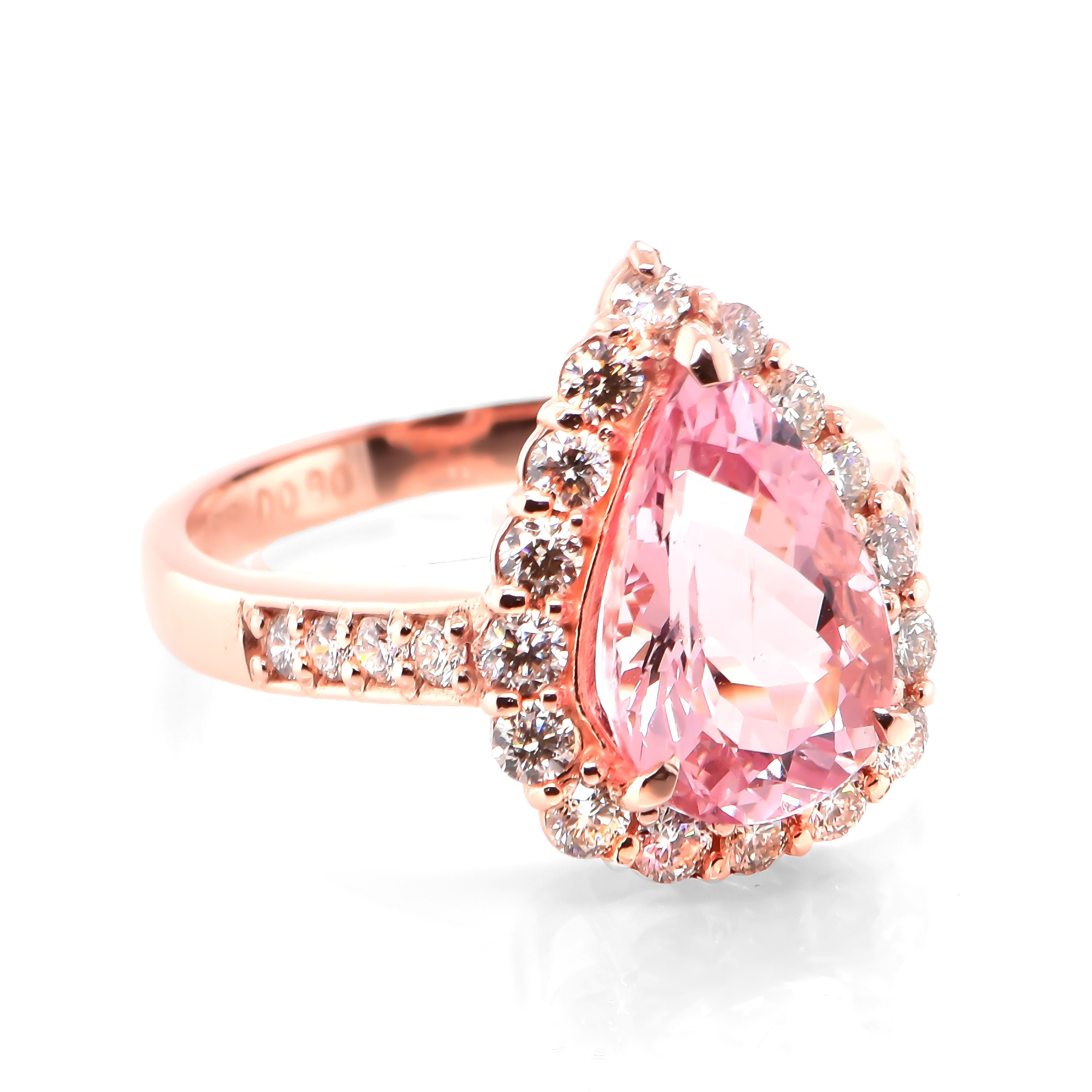 A beautiful Cocktail Ring featuring a 2.88 Carat, Natural Morganite (Pink Beryl) and 0.80 Carats of Diamond Accents set in 18 Karat Rose Gold. Having been first discovered in the early 1900s, Morganite was named after the famed banker and gem