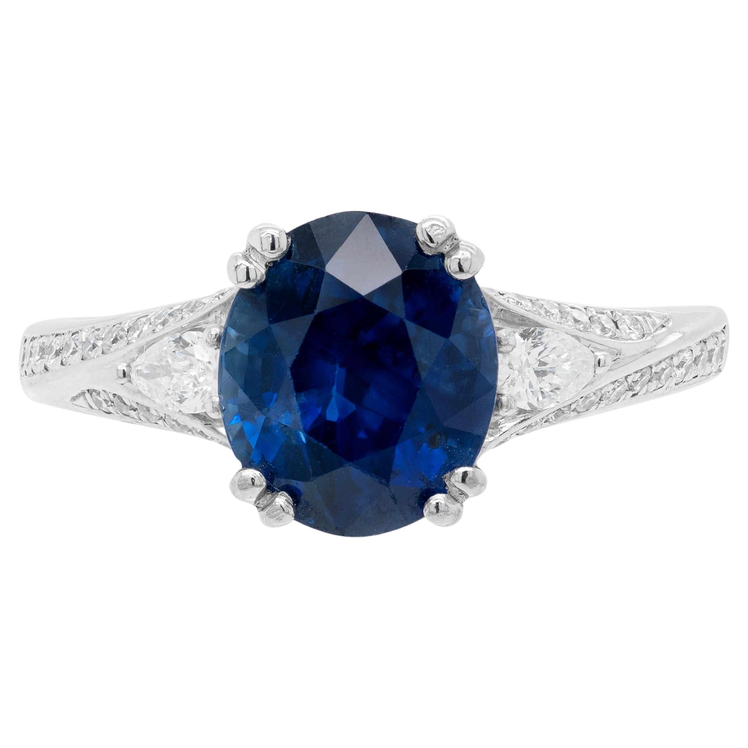 2.88 Carat Oval Blue Sapphire and Diamond Platinum Engagement Ring For Sale