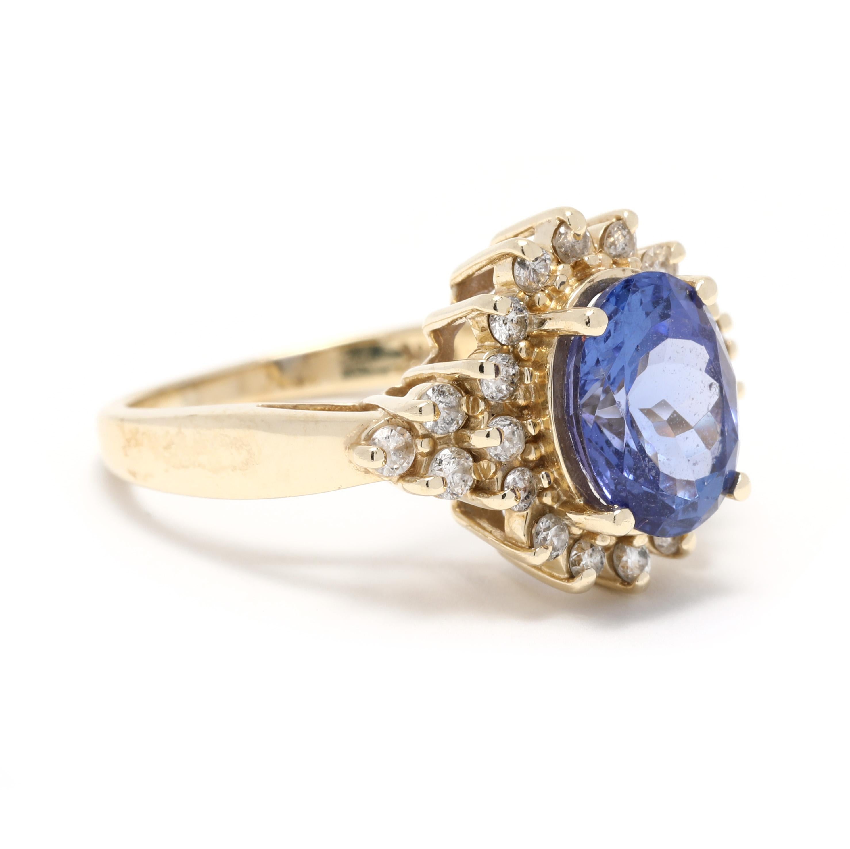 This stunning 2.88ctw Tanzanite and Diamond Halo Cocktail Ring is perfect for your special day! Crafted in 14K Yellow Gold, this ring features a stunning 2.5ct Natural Tanzanite center stone accented with a halo of genuine round diamonds. The ring