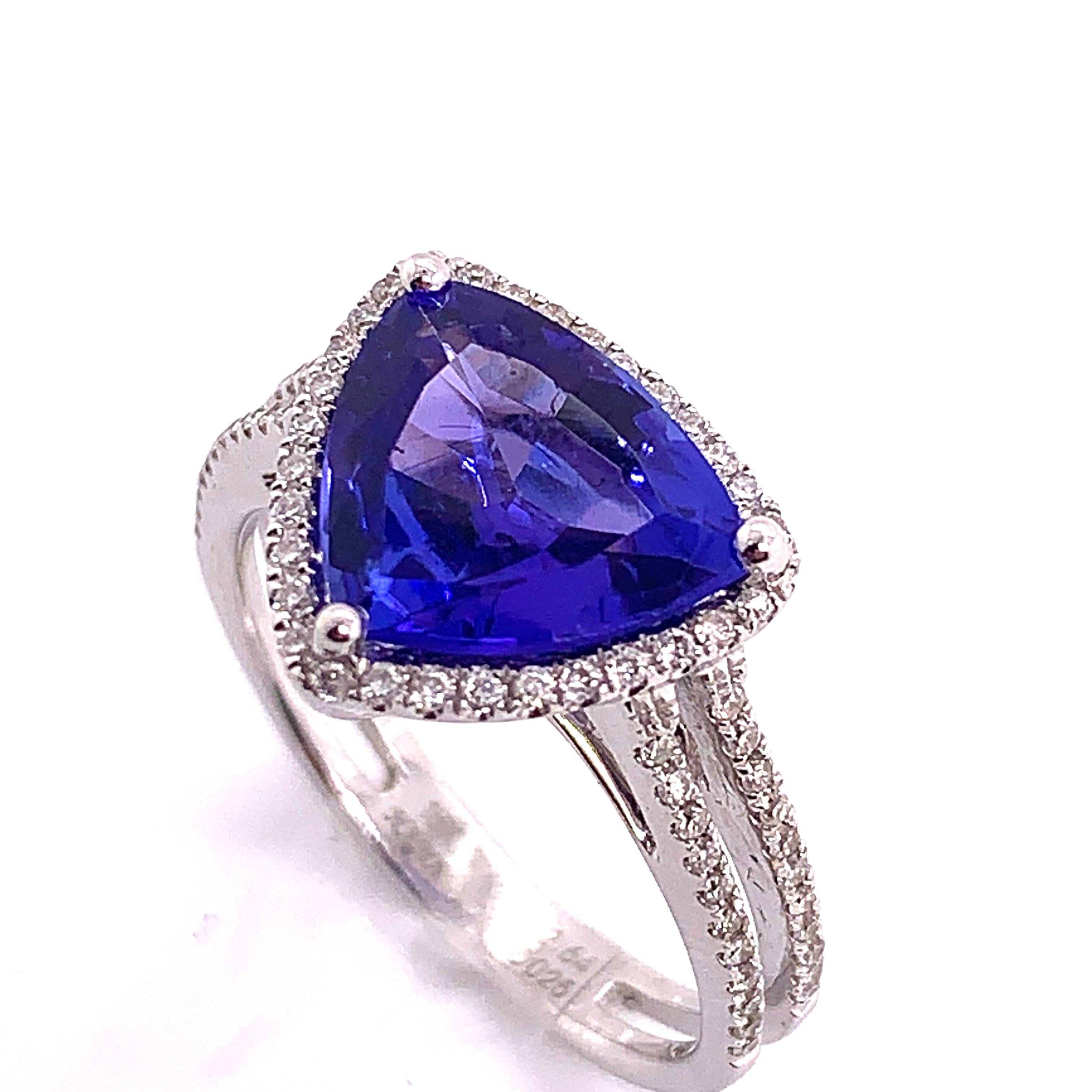 A beautiful 18K white gold ring made by Shimon's Creations featuring a 2.64 carat tanzanite with a strong and shiny blue color and 0.25 carat diamonds.
 
Color Stone And Diamond Breakdown:
Diamonds: 0.25 carats - 74 round stones 
Tanzanite: 2.64