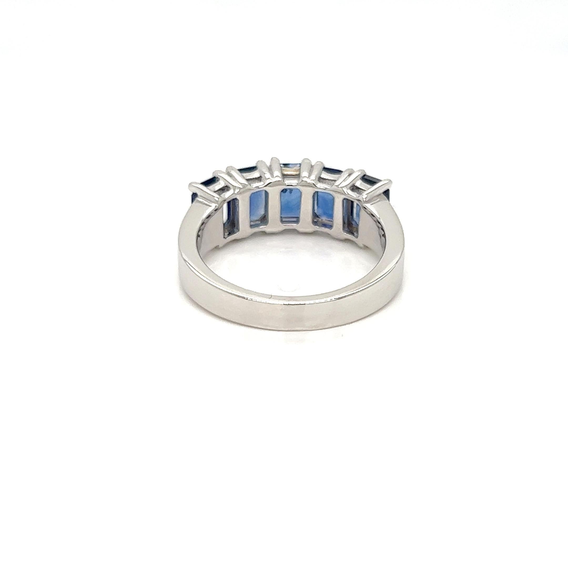 For Sale:  2.89 Carats Sapphire Emerald Cut Eternity Ring in 18K White Gold 4
