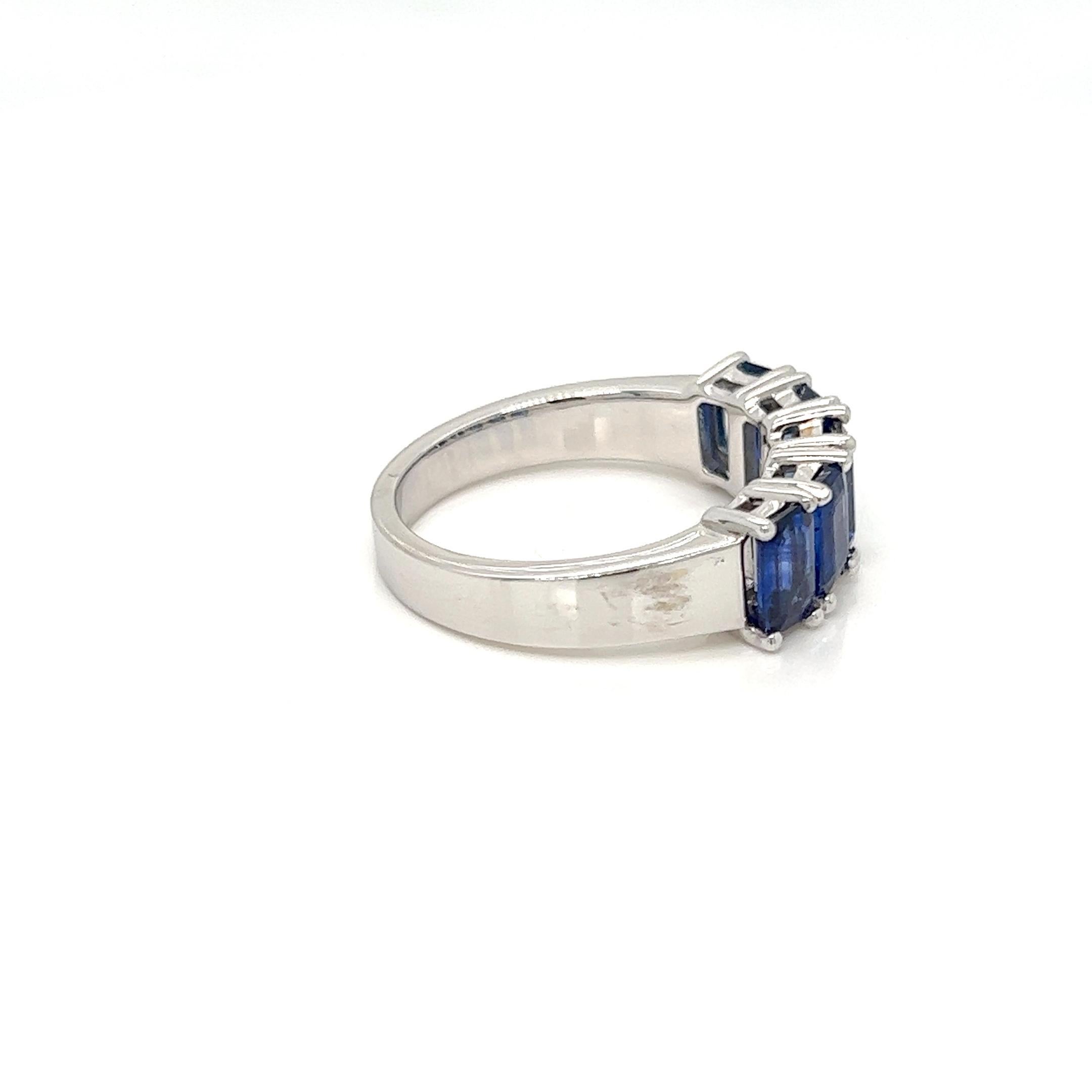For Sale:  2.89 Carats Sapphire Emerald Cut Eternity Ring in 18K White Gold 5