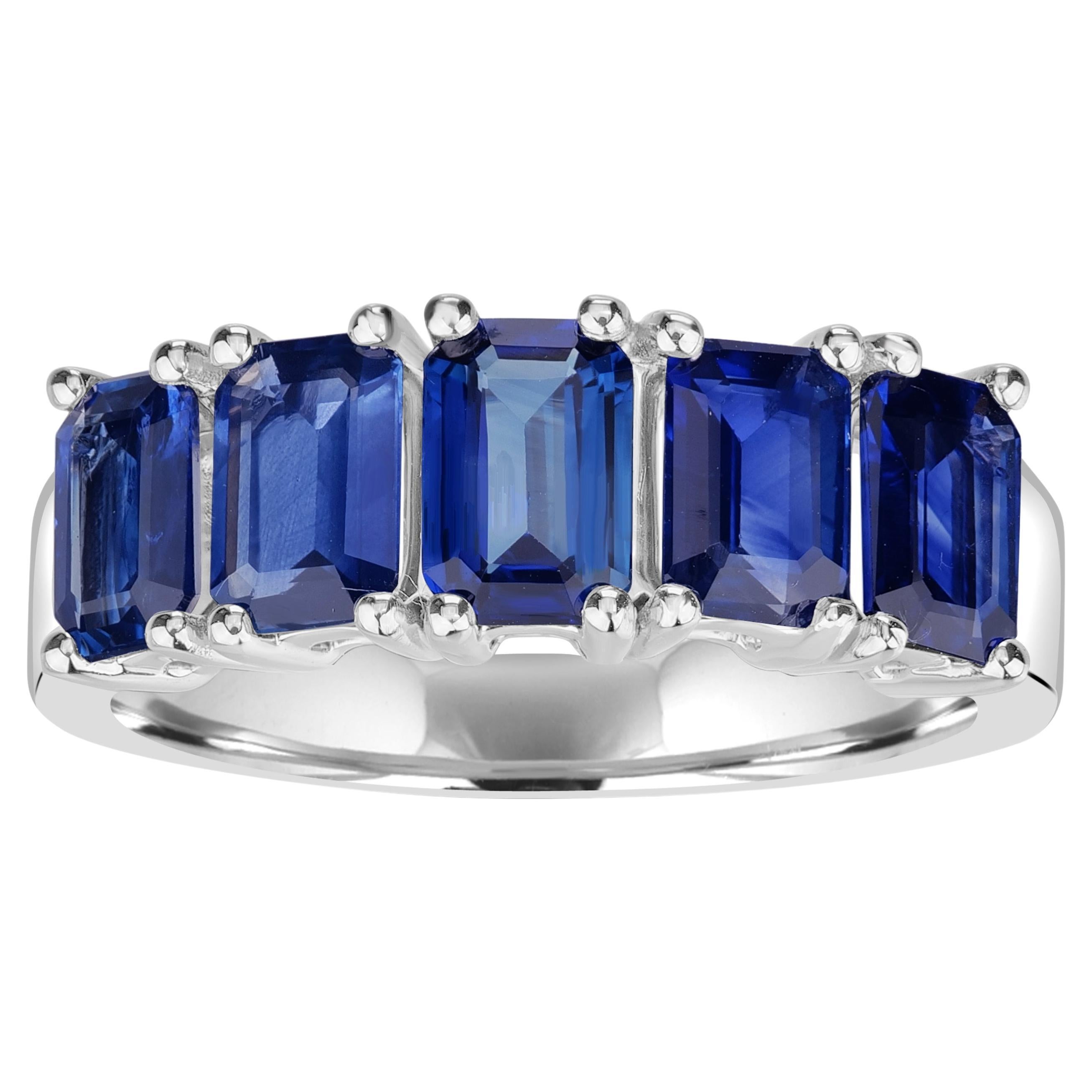 For Sale:  2.89 Carats Sapphire Emerald Cut Eternity Ring in 18K White Gold
