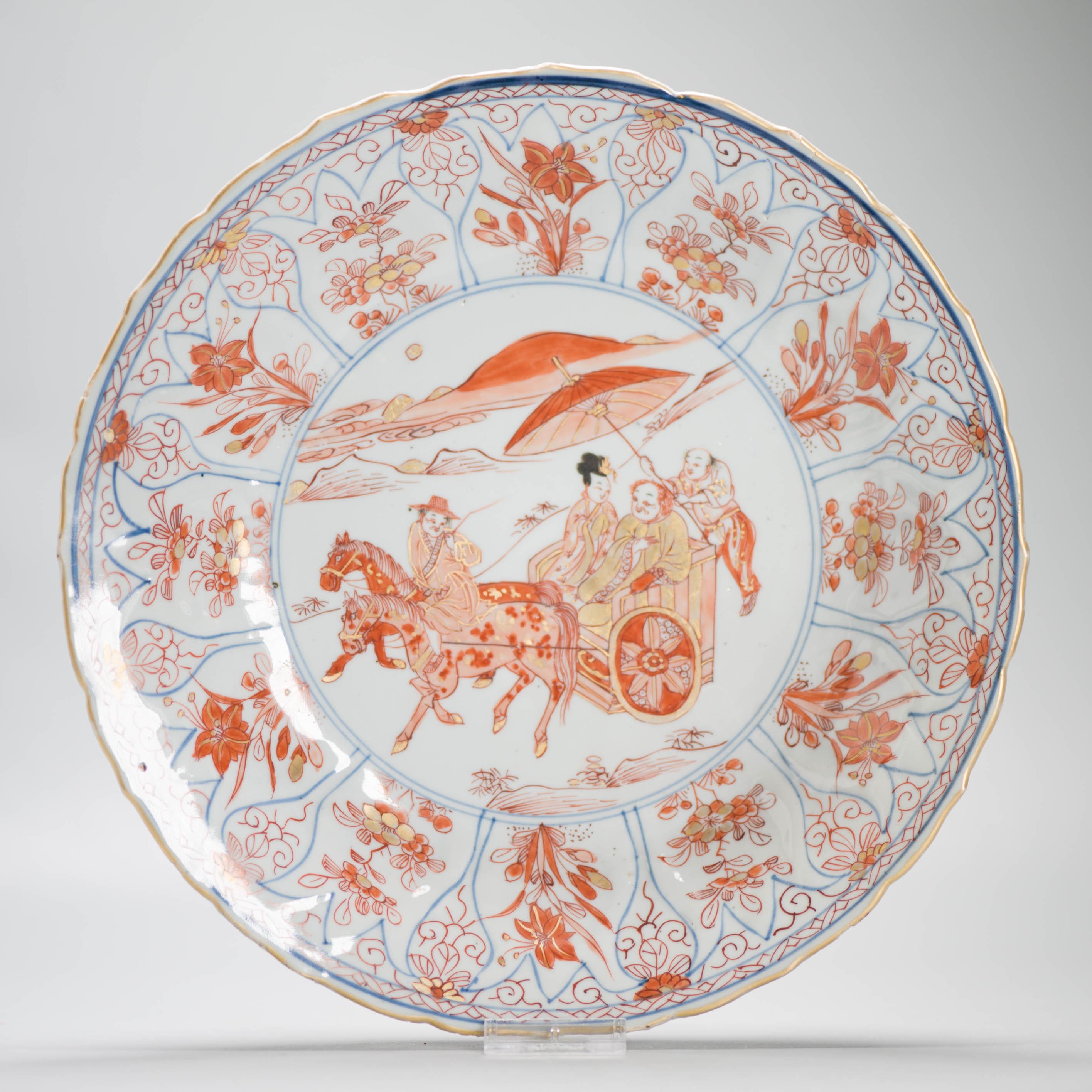 

Sharing with you this lovely dish on footring, the sides modelled as pomegranate-shaped panels in low relief, lightly scalloped rim. Decorated in iron-red and gold on the glaze. Porcelain dish with modelled tulip motif in the side and scalloped