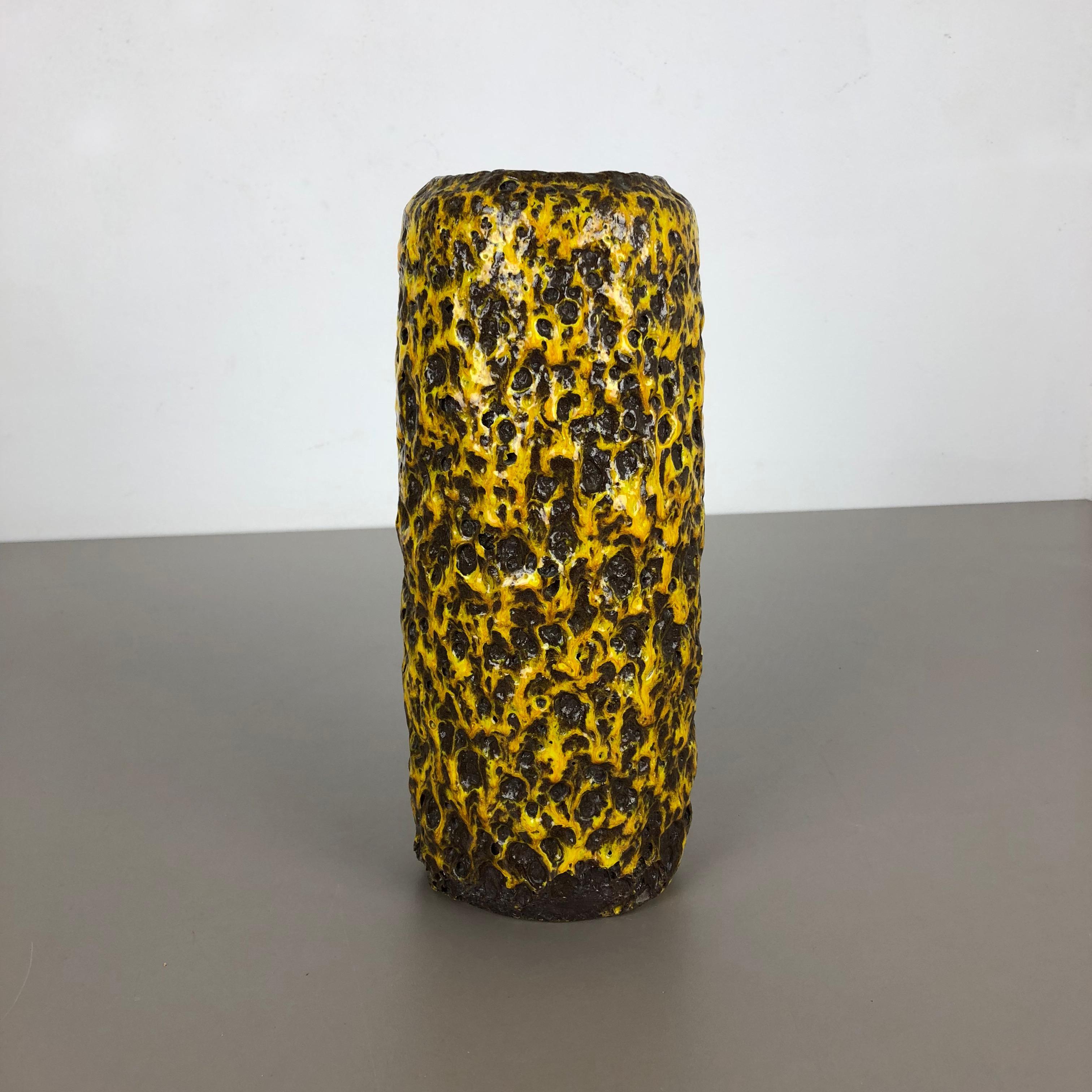Article:

Fat lava art vase, heavy brutalist glaze


Producer:

Scheurich, Germany



Decade:

1970s




This original vintage vase was produced in the 1970s in Germany. It is made of ceramic pottery in fat lava optic with abstract