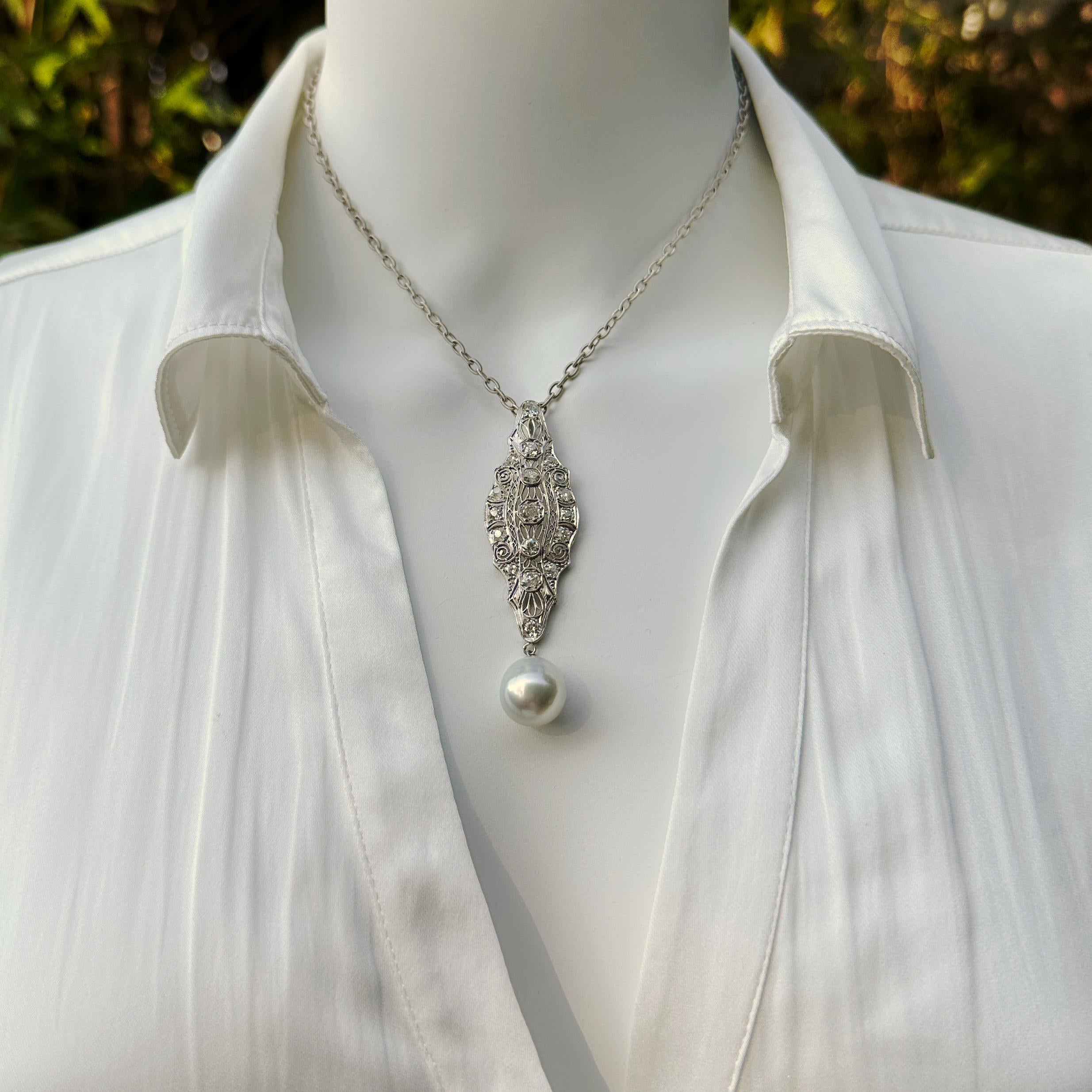 Eytan Brandes made the ultimate one-of-a-kind statement pendant using a traditional ladies diamond brooch and a gorgeous white South Sea pearl.  

The standout feature of this pendant, besides the pearl, is the array of old cut diamonds.  We