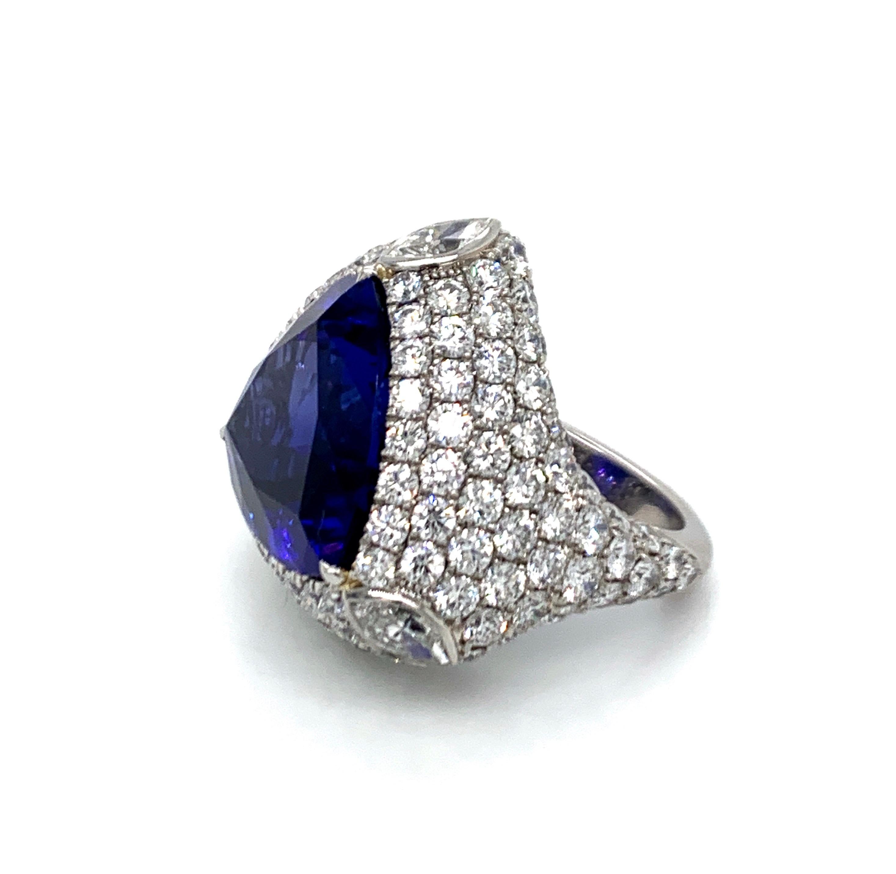 Contemporary 28 Carat Tanzanite Diamond Platinum Ring For Sale