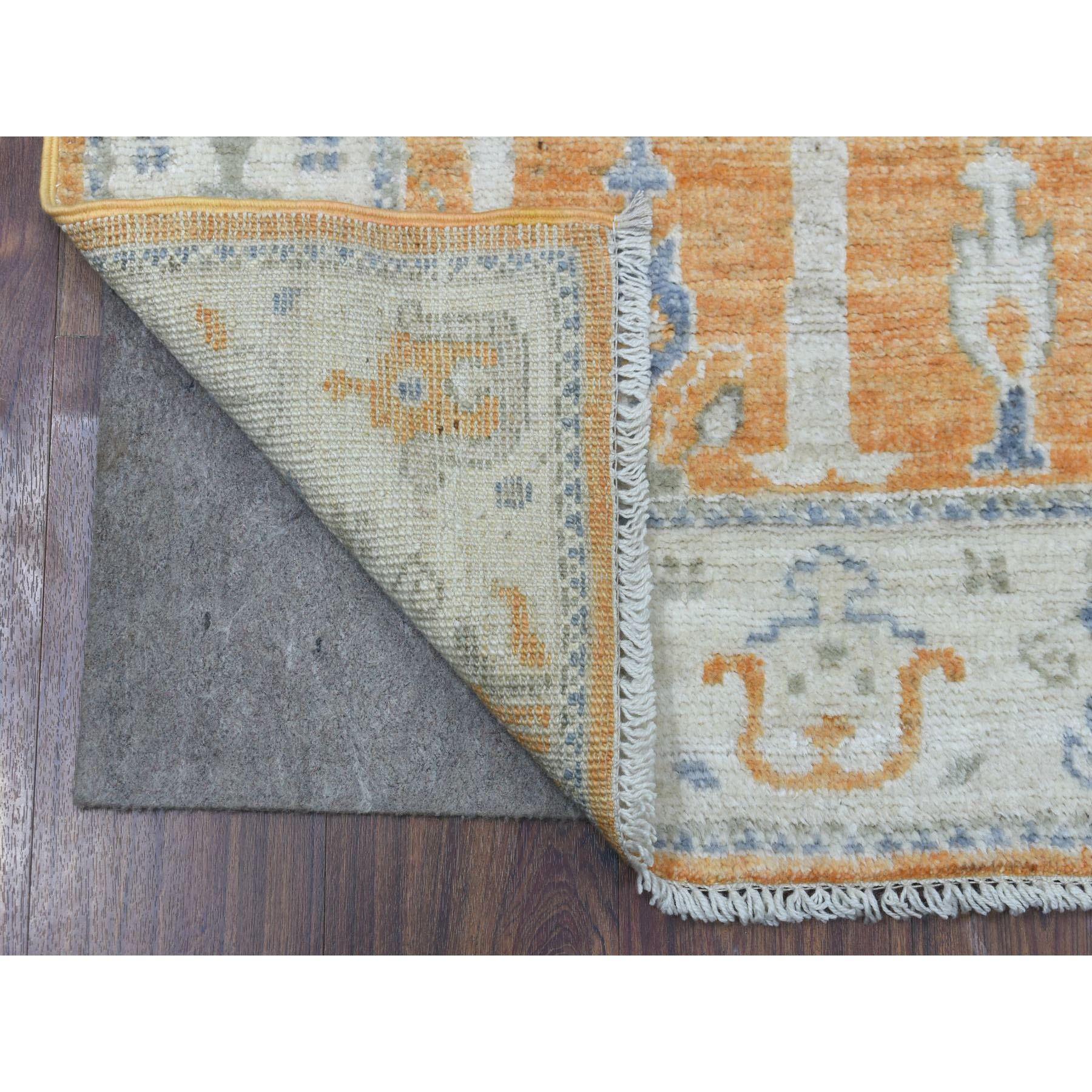 This is a truly genuine one-of-a-kind Sunrise Orange Angora Oushak with Willow and Cypress Tree Design Organic Wool Hand Knotted Oriental Runner Rug. It has been Knotted for months and months in the centuries-old weaving craftsmanship techniques by