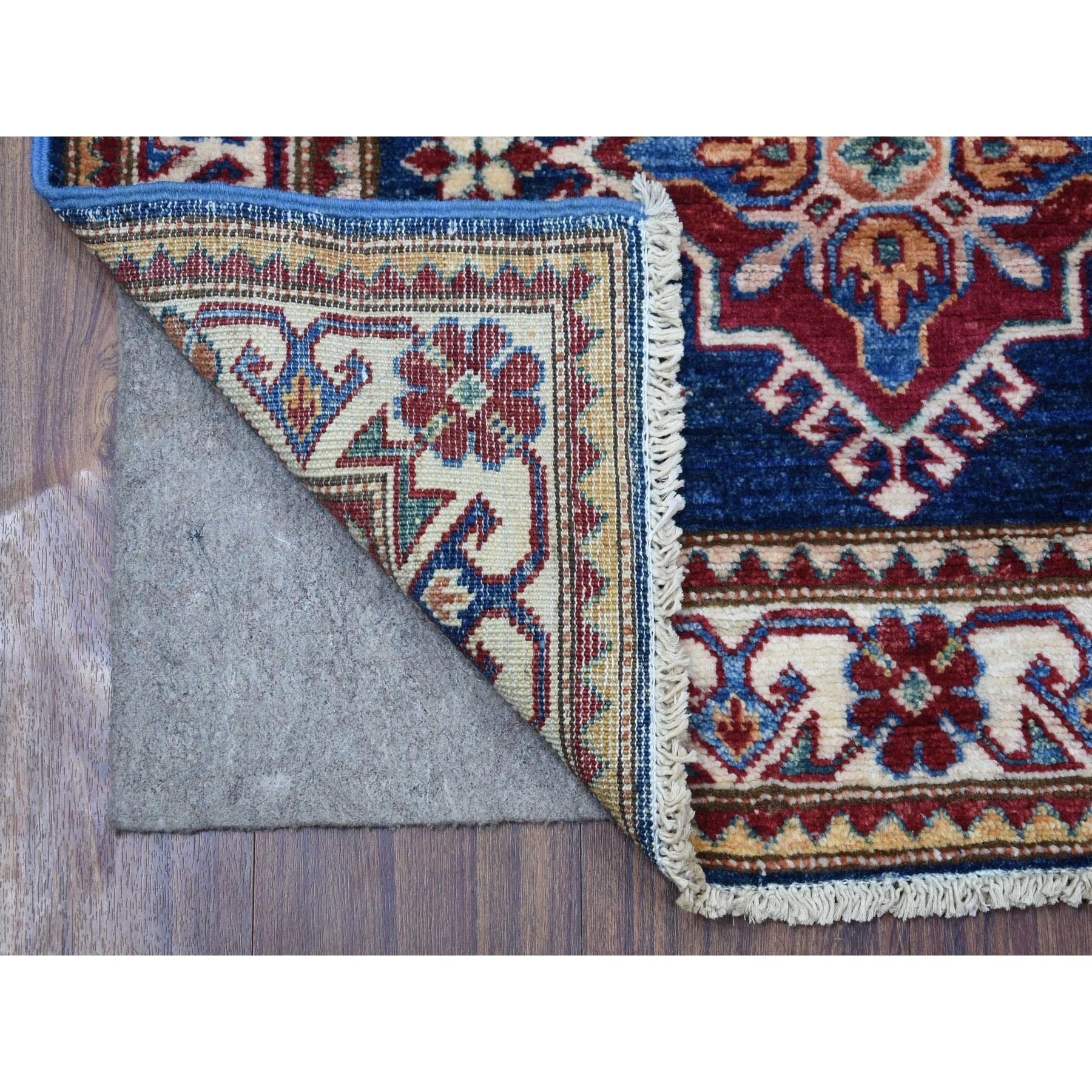 This is a truly genuine one-of-a-kind Hand Knotted Denim Blue Extra Soft Wool Super Kazak with Tribal Medallions Design Oriental Runner Rug. It has been Knotted for months and months in the centuries-old weaving craftsmanship techniques by expert