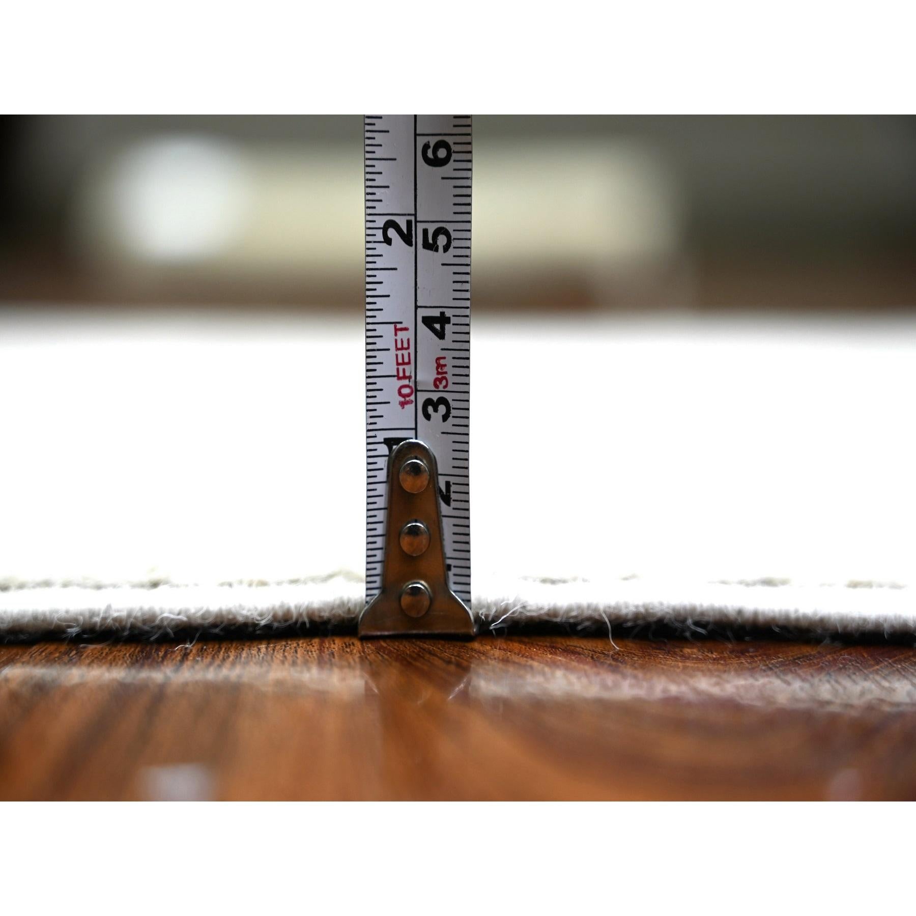 Noué à la main 2'8 