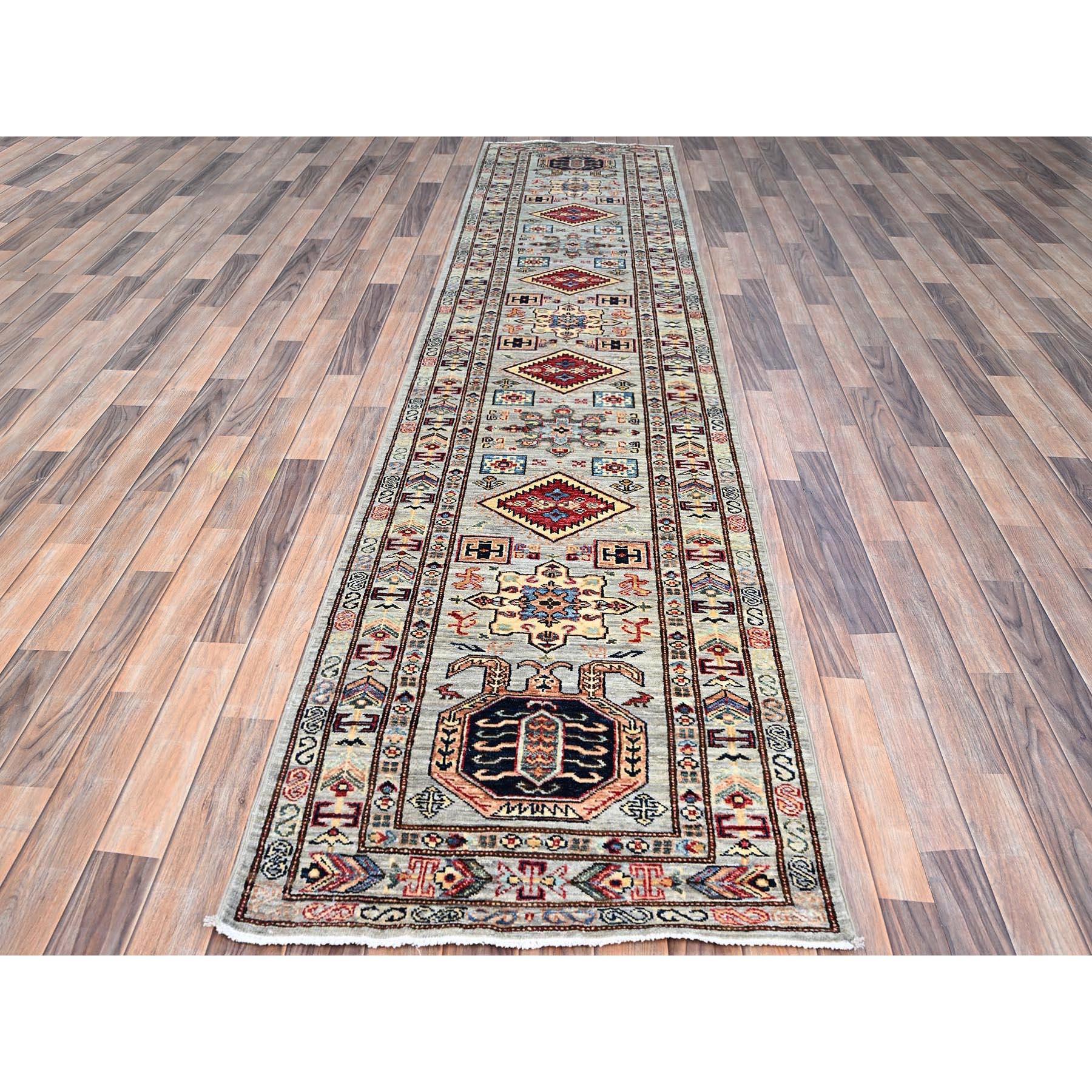 This is a truly genuine one-of-a-kind Super Kazak, Hand Knotted, Pure Wool, and Oriental Rug. It has been Knotted for months and months in the centuries-old weaving craftsmanship techniques by expert artisans
Primary materials: Wool
Latex: No Pile