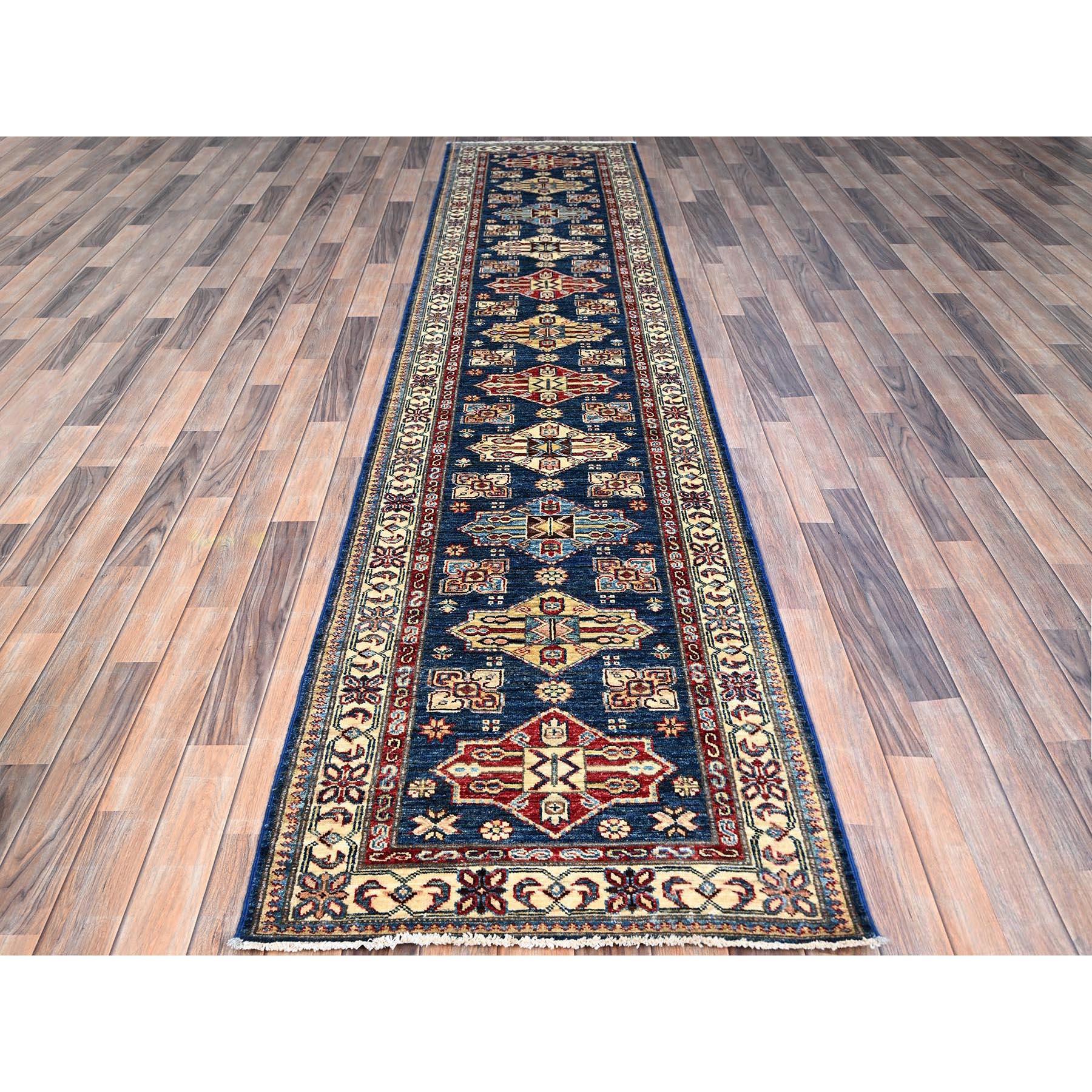 This is a truly genuine one-of-a-kind Super Kazak, Hand Knotted, Pure Wool, and Oriental Rug. It has been Knotted for months and months in the centuries-old weaving craftsmanship techniques by expert artisans.
Primary materials: Wool
Latex: No Pile