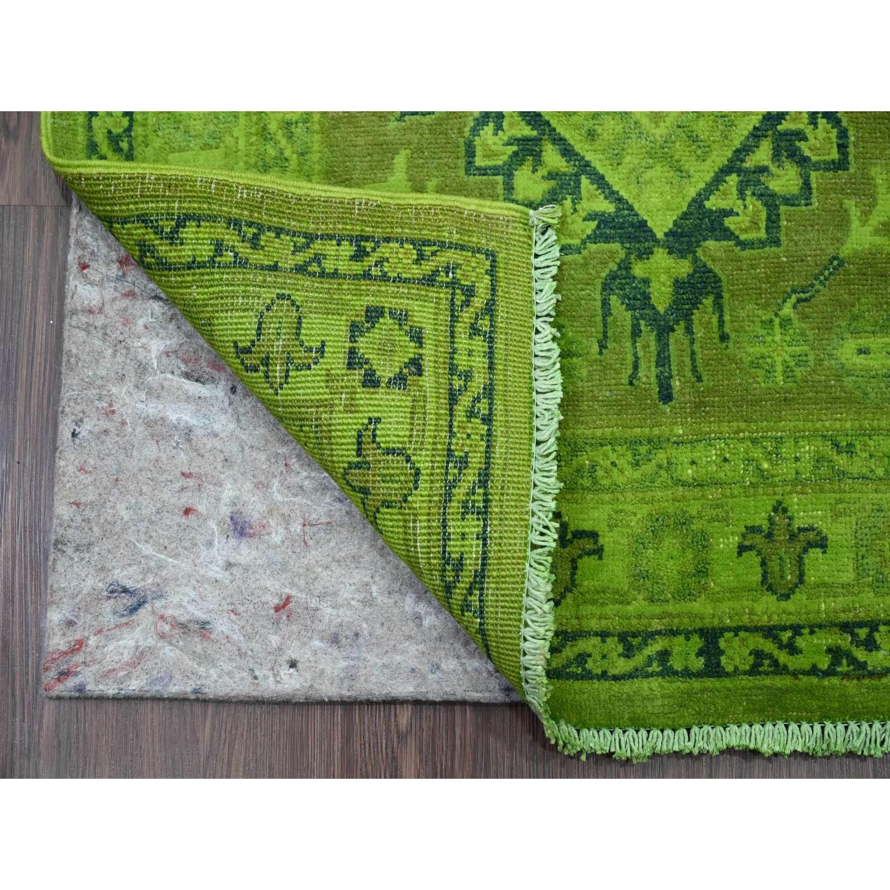 Iguana Green, Overdyed Kazak with Geometric Medallion Design, Hand Knotted, 100% Wool, XL Runner, Oriental Rug
Primary materials: Wool
Latex: No Pile 
height: 0.25 Inches
Style: Traditional
Primary color: Green
Secondary colors: None
Pattern: