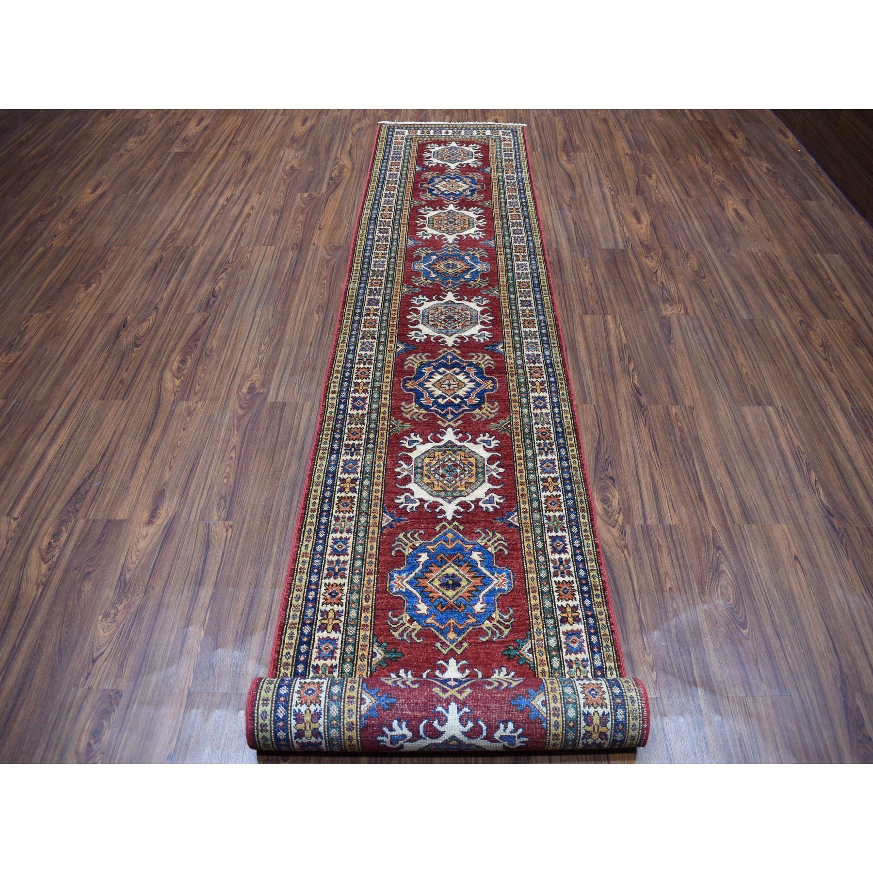 This is a truly genuine one-of-a-kind Red Super Kazak Pure Wool Geometric Design XL Runner Hand-Knotted Rug.It has been Knotted for months and months in the centuries-old Persian weaving craftsmanship techniques by expert