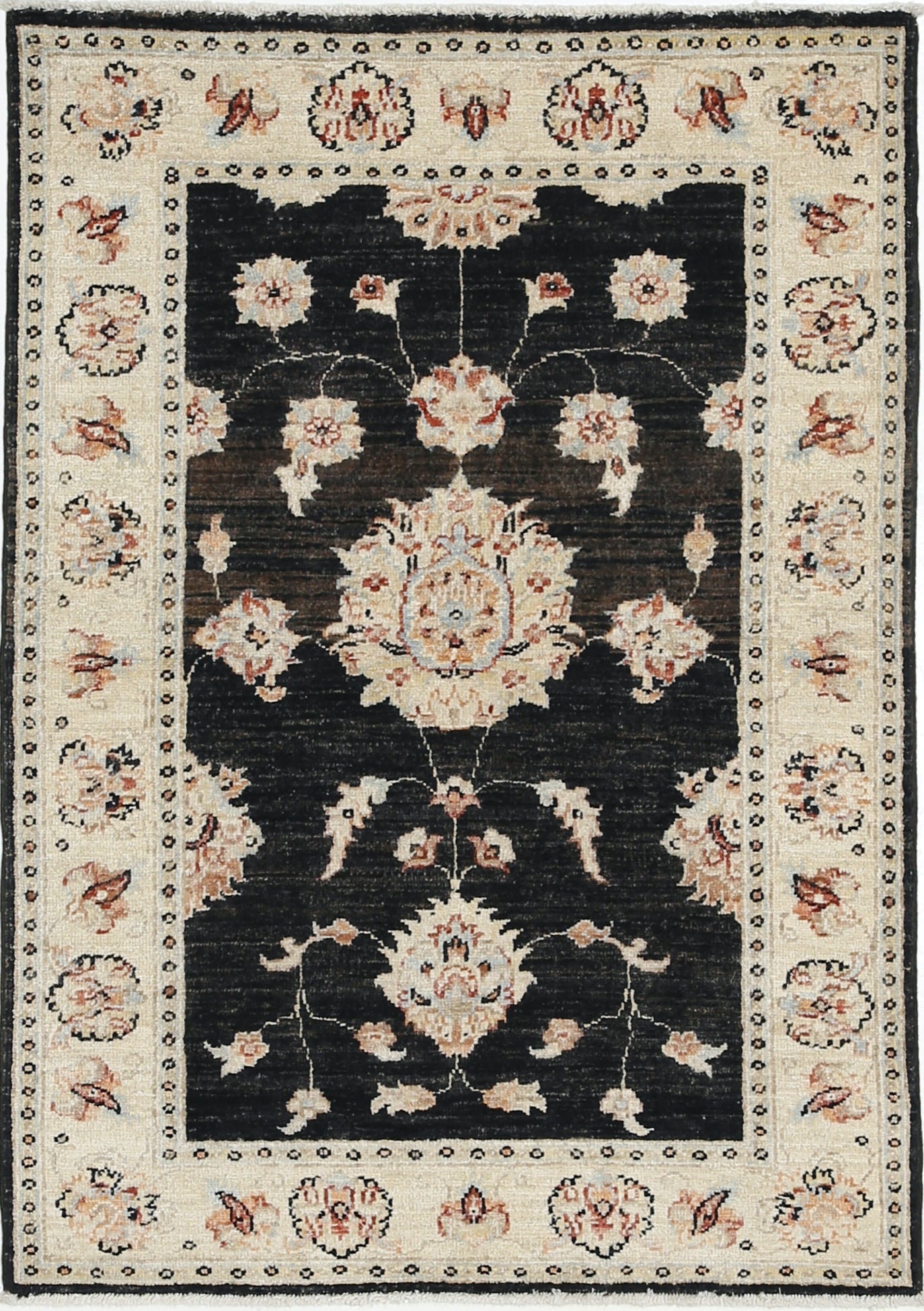 Tappeto turco floreale annodato a mano di colore nero e avorio. 100% Lana