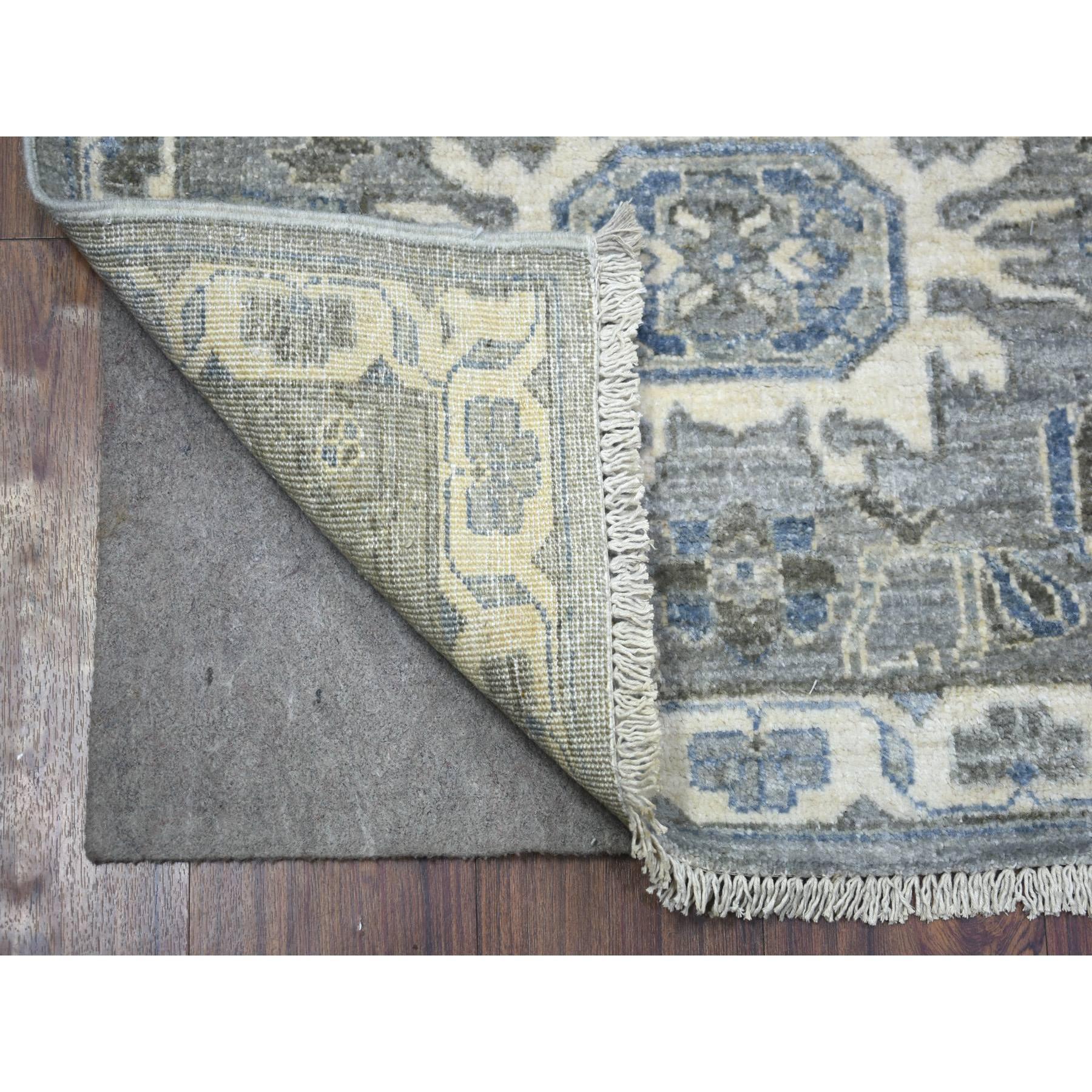This is a truly genuine one-of-a-kind Light Gray, Fine Peshawar with Karajeh Design, Densely Woven Afghan Wool Hand Knotted, Runner Oriental Rug. It has been Knotted for months and months in the centuries-old weaving craftsmanship techniques by