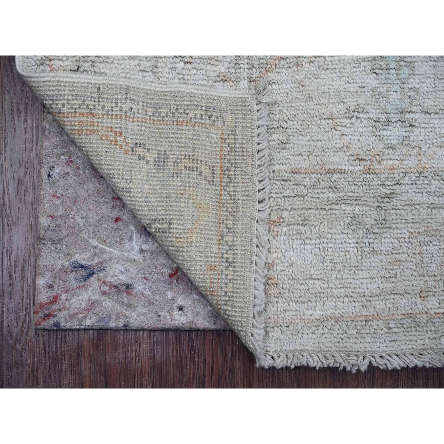 Misty Gray, Hand Knotted, Afghan Angora Oushak with Cypress Tree Design, Veggie Dyes, 100% Wool, Runner, Oriental Rug
Primary materials: Wool
Latex: No Pile 
height: 0.25 Inches
Style: Transitional
Primary color: Grey
Secondary colors: Orange, Blue,
