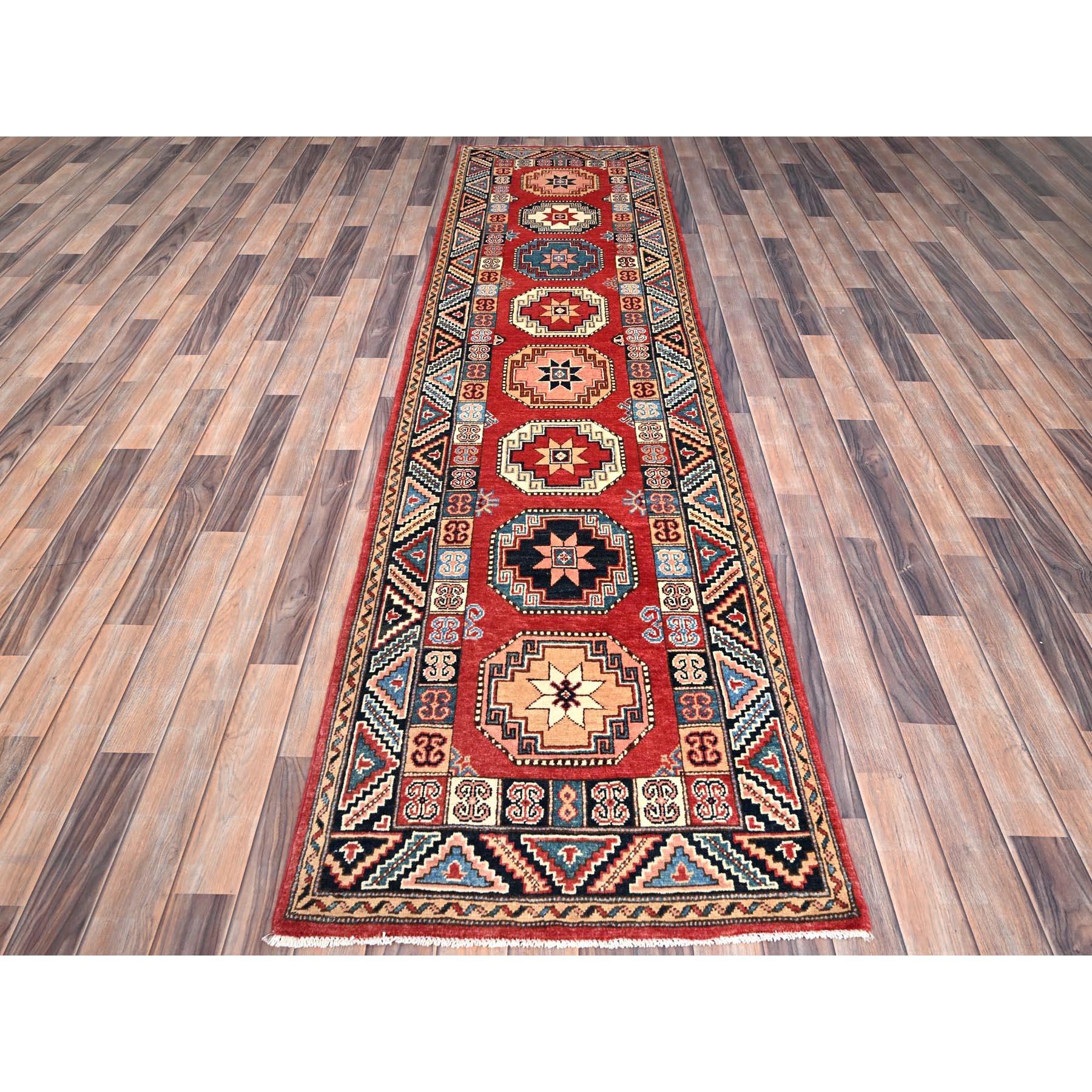 This is a truly genuine one-of-a-kind Kazak, Hand Knotted, Pure Wool, Oriental Rug. It has been Knotted for months and months in the centuries-old weaving craftsmanship techniques by expert artisans.
Primary materials: Wool
Latex: No Pile 
height: