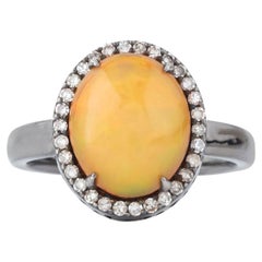 Solitärring mit 2.9 Karat Diamant und Opal
