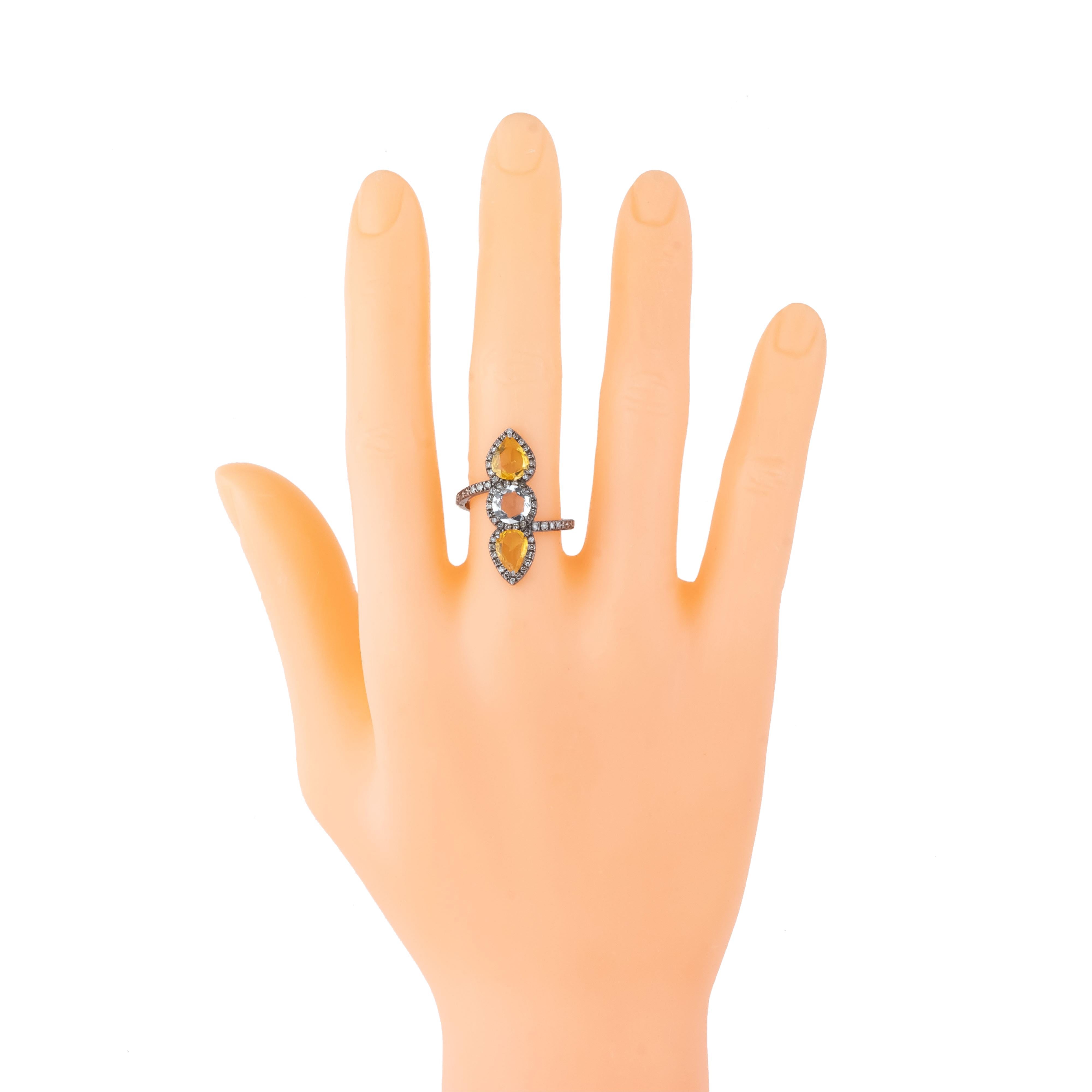 The 2.9 Carat Diamond and Yellow Sapphire Three Stone Ring radiates an unmatched elegance and vibrant sophistication. This exquisitely designed piece features a trio of stunning gemstones, with a captivating yellow sapphire as its centerpiece. The