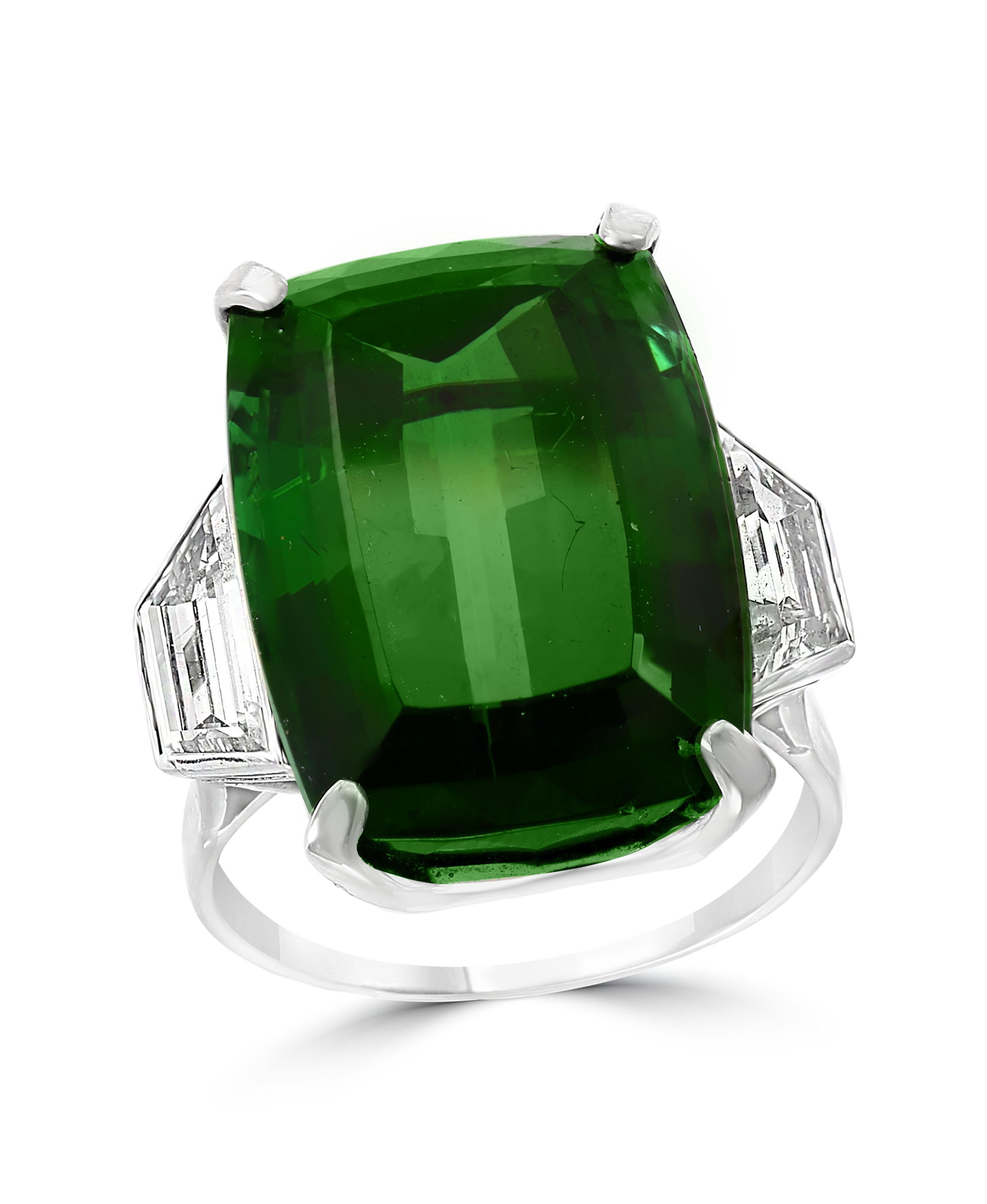 29+ Carat Green Tourmaline and  1.98 Ct solitaire Diamond Cocktail Ring  Platinum Estate
A classic, Cocktail ring 
Huge 29.26  Carat of very clean no inclusion  Green Tourmaline full of luster and shine  and Diamond ring.
Two diamonds weight is 1.98