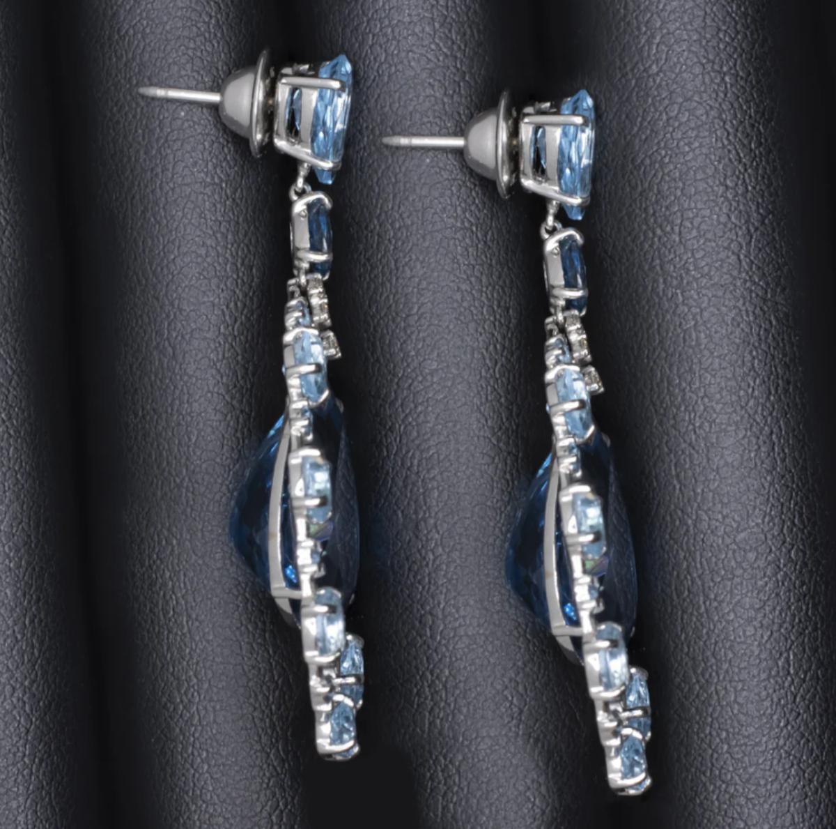 Pear Cut 29 Carat London Blue Topaz and Diamond Dangle Earrings in 18K White Gold For Sale